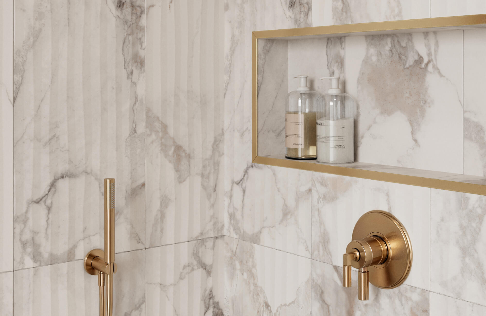 null Minimalist shower with marble-look wall tiles, brass fixtures, and a recessed shelf in a modern small bathroom design