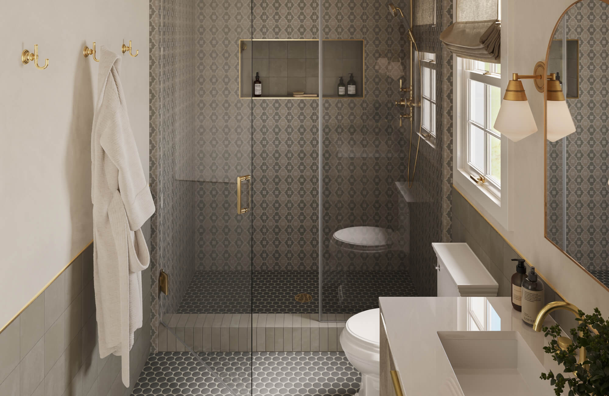 Chic bathroom with patterned wall tiles and dark hex tile flooring, accented by gold fixtures and a glass-enclosed shower.