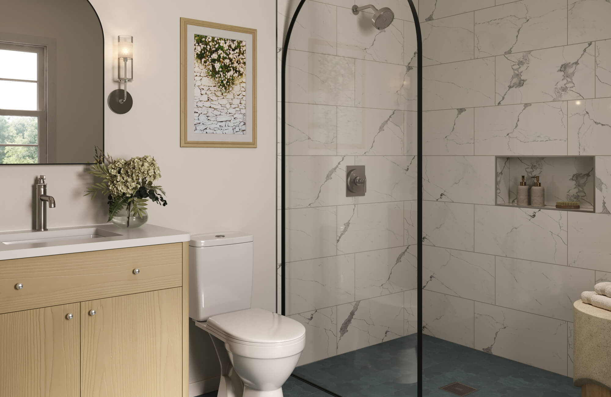 Bright bathroom with large format marble look shower tiles, arched glass enclosure, and light wood vanity with brushed nickel fixtures.