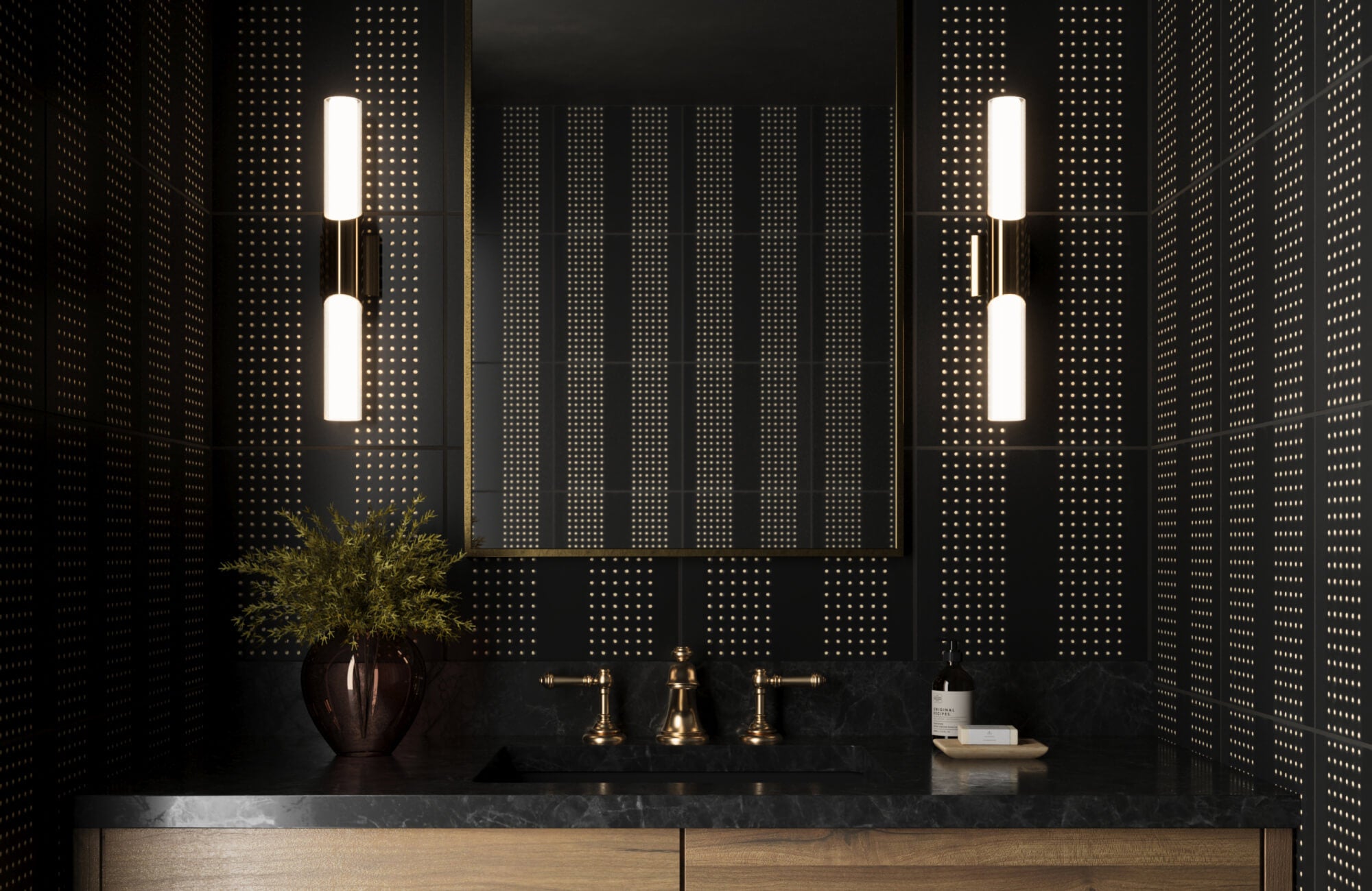 null Moody bathroom with black metallic wall tiles, warm brass fixtures, and sleek modern lighting flanking a central mirror.