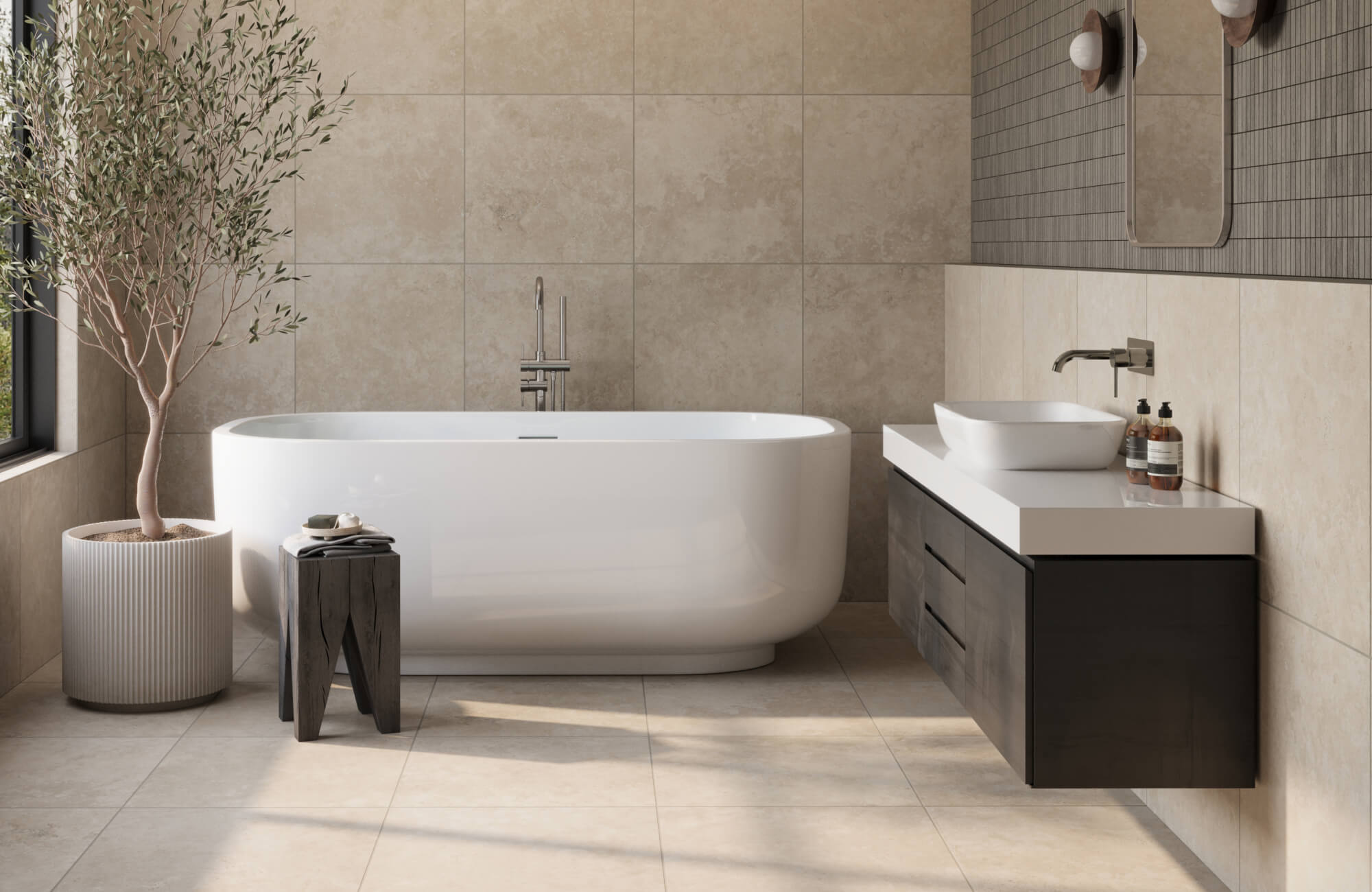 null Contemporary bathroom with large beige stone-look tiles, a freestanding white bathtub, and soft natural lighting enhanced by modern wall sconces.