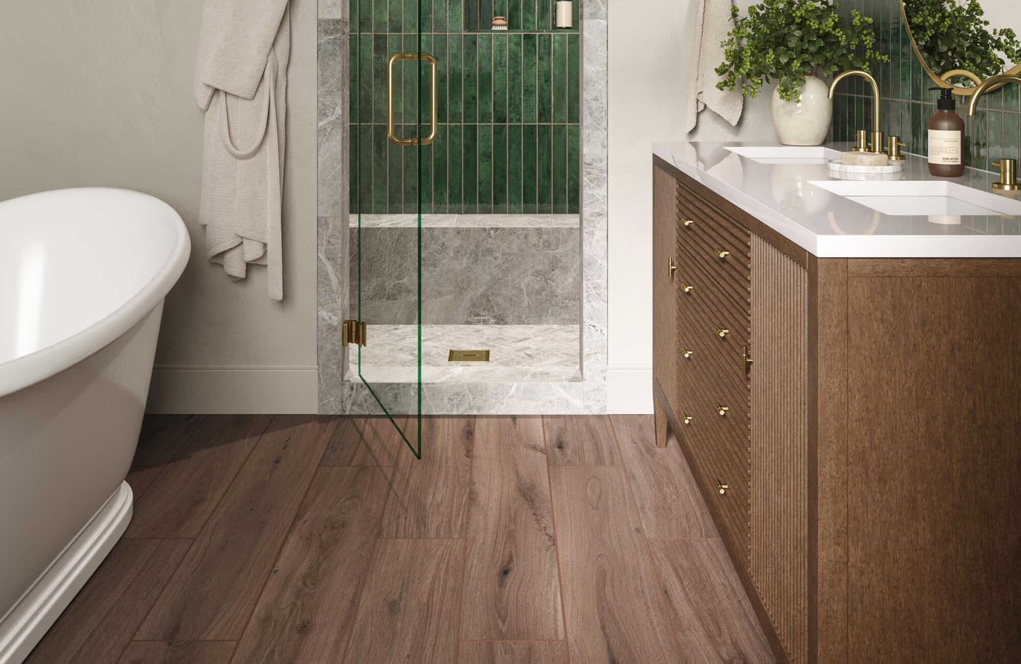 null Bathroom with rich green vertical bathroom tile shower walls framed in marble, wood look tile flooring, paired with warm gold fixtures and soft natural lighting.