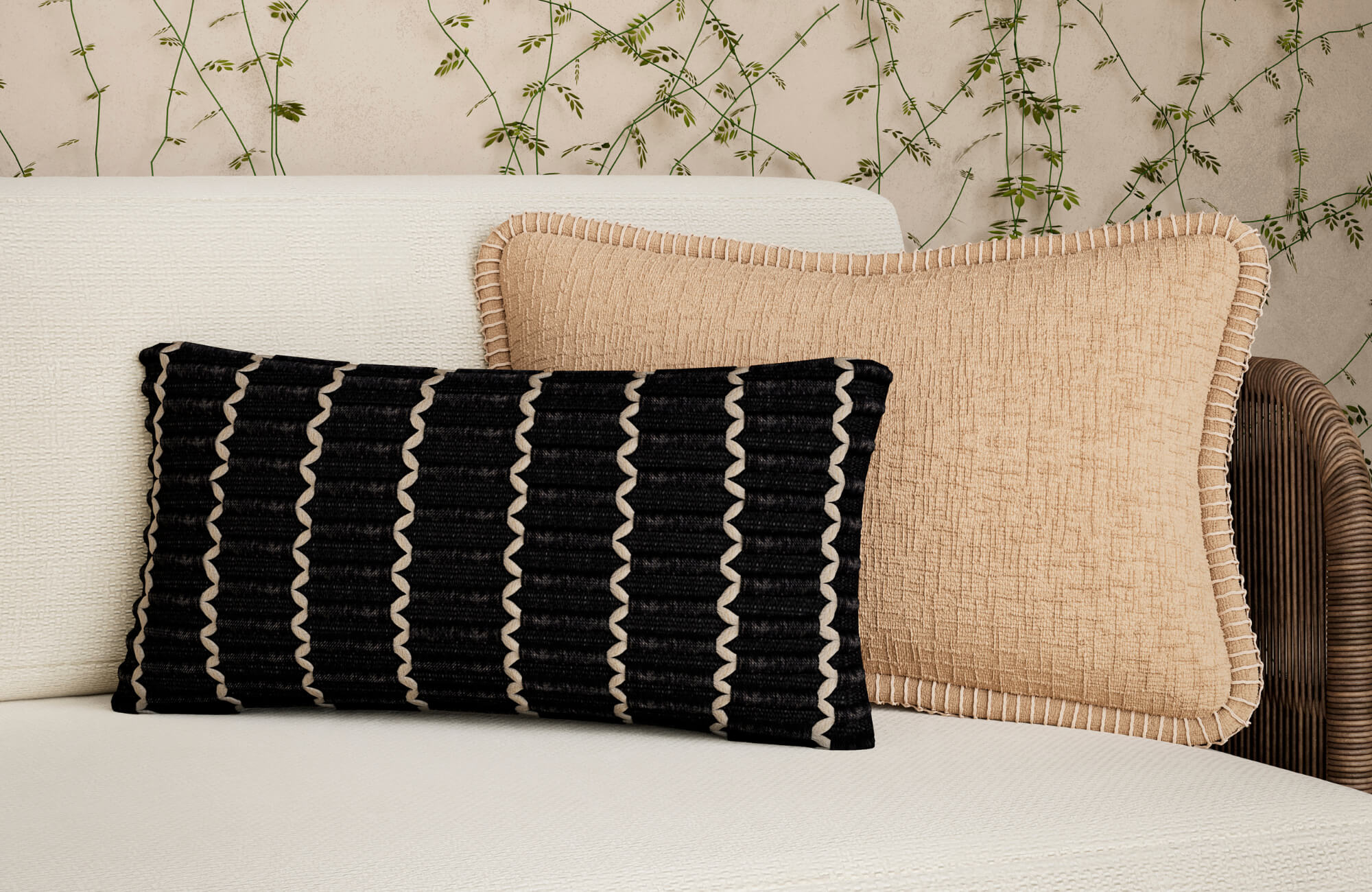 null Close-up of black and beige patterned lumbar pillow layered over textured neutral cushion on cream sofa.