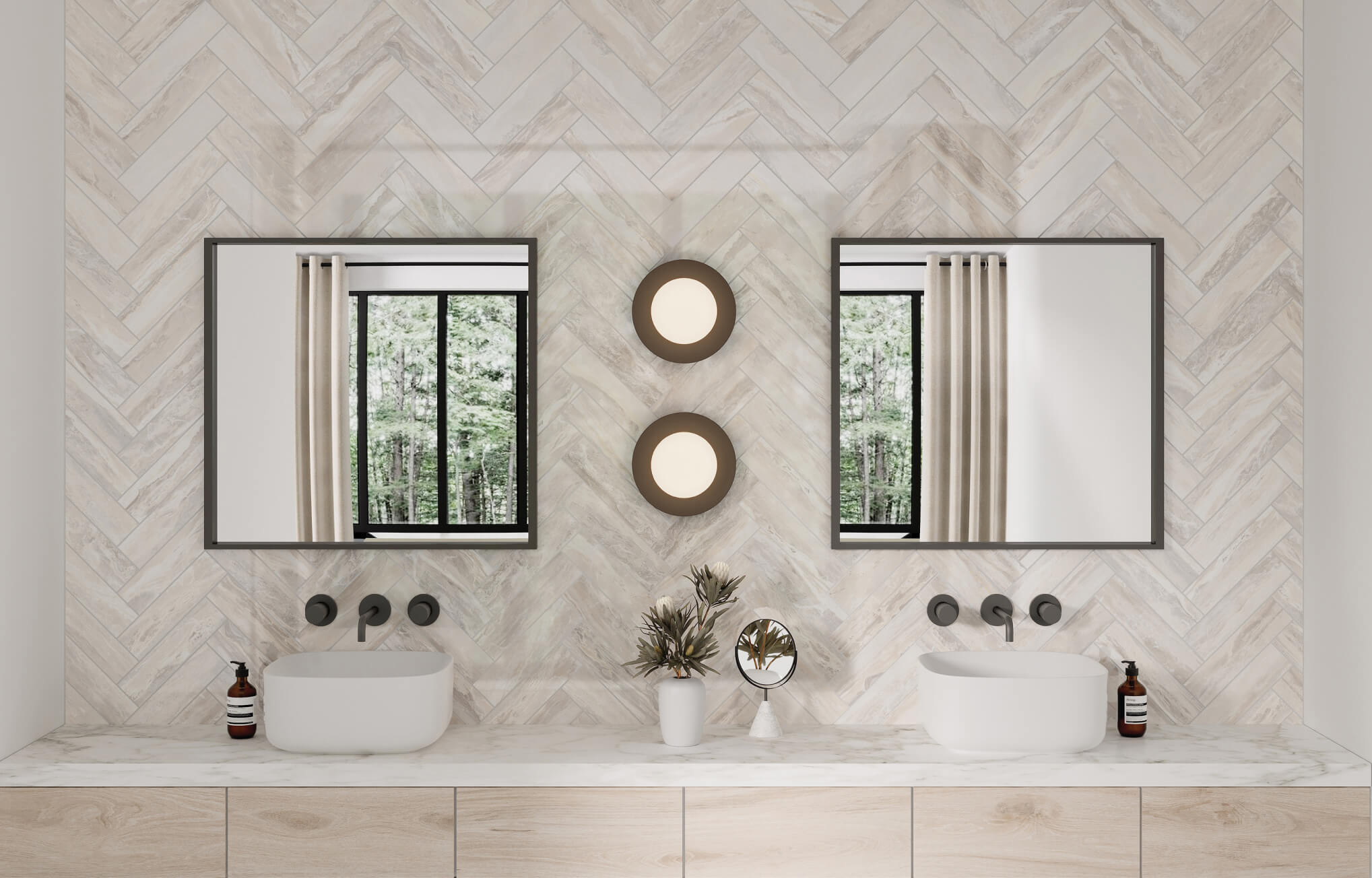 null Light wood look 45-degree herringbone subway tiles add texture to a dual vanity wall framed by modern mirrors and warm lighting.