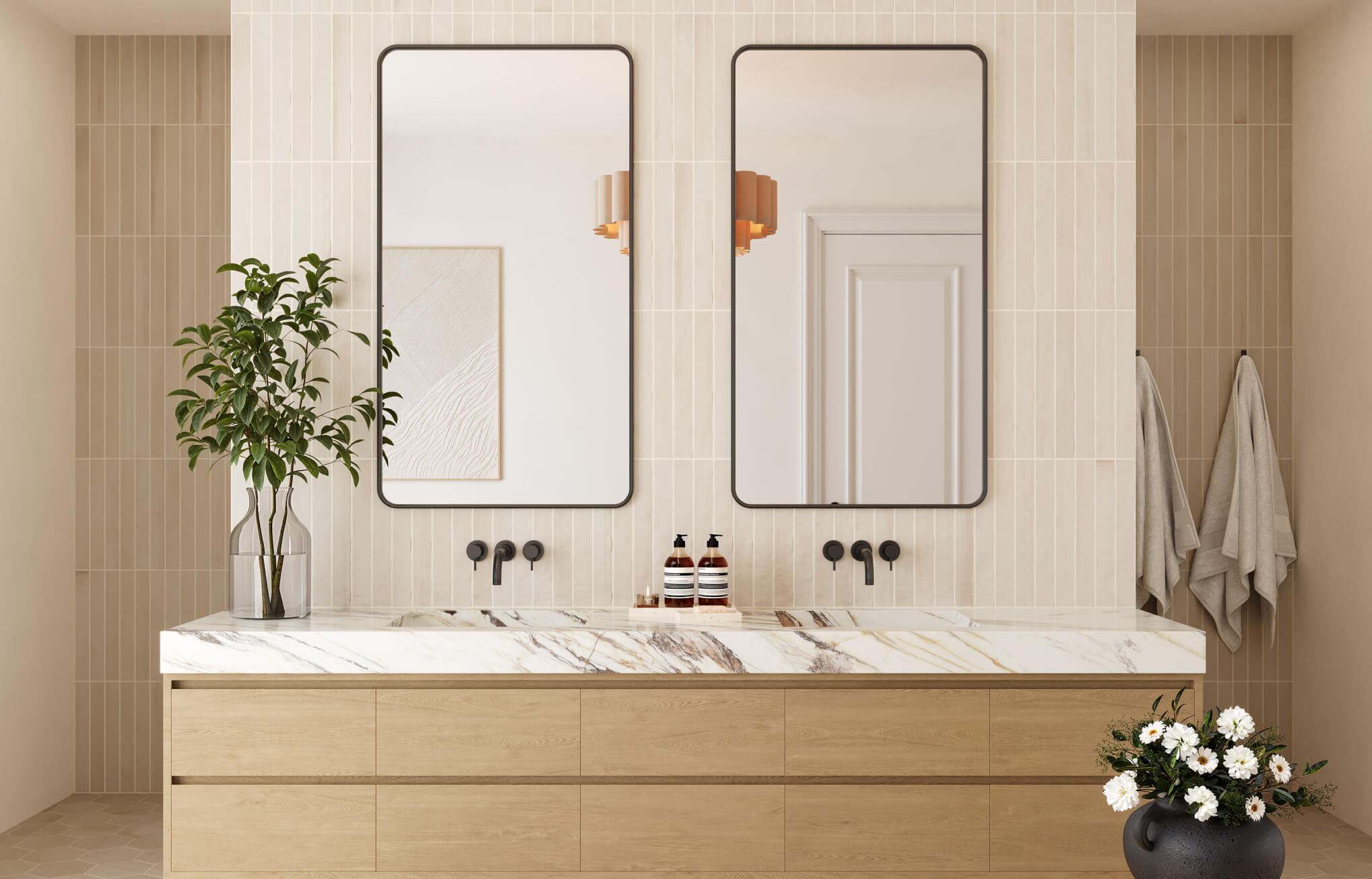 null Cream vertical subway tiles surround a double vanity, paired with black hardware and soft natural wood cabinetry for a spa-like feel.