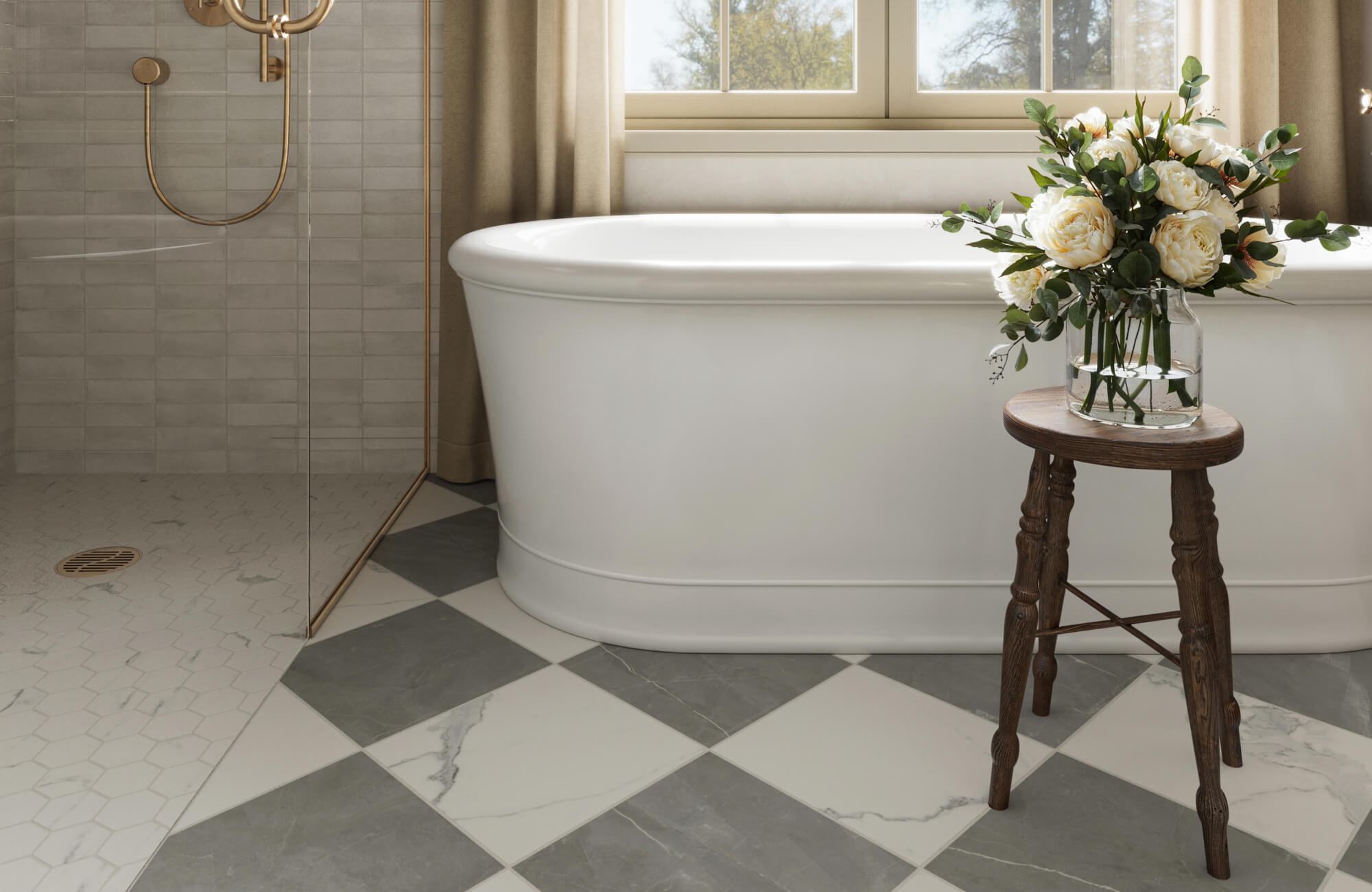 Bathroom with freestanding tub, white hexagon mosaic shower floor tile, and gray and white large-format bathroom floor tile layout in a checker pattern.