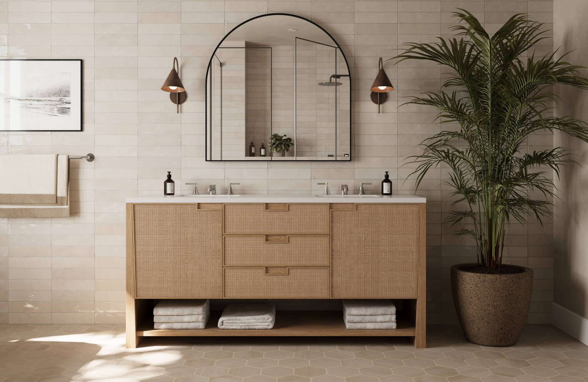 null Modern bathroom with a rattan-textured double-sink vanity, arched mirror, wall sconces, and open towel storage on a neutral tiled wall.