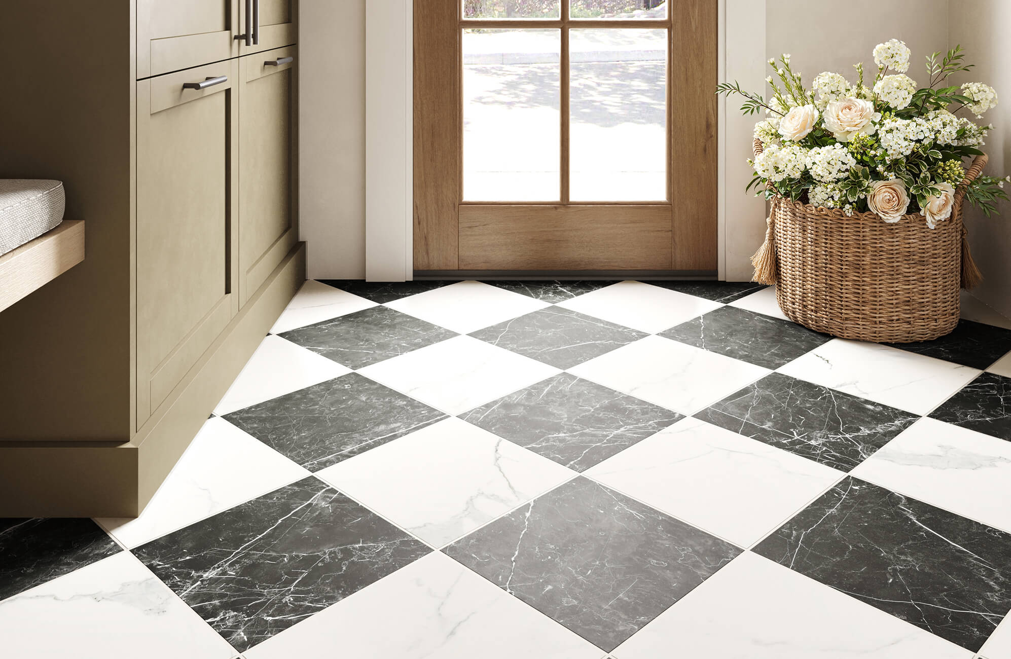 Elegant black and white marble-look tiles laid in a classic checkerboard pattern, adding timeless charm to a sunlit entryway.