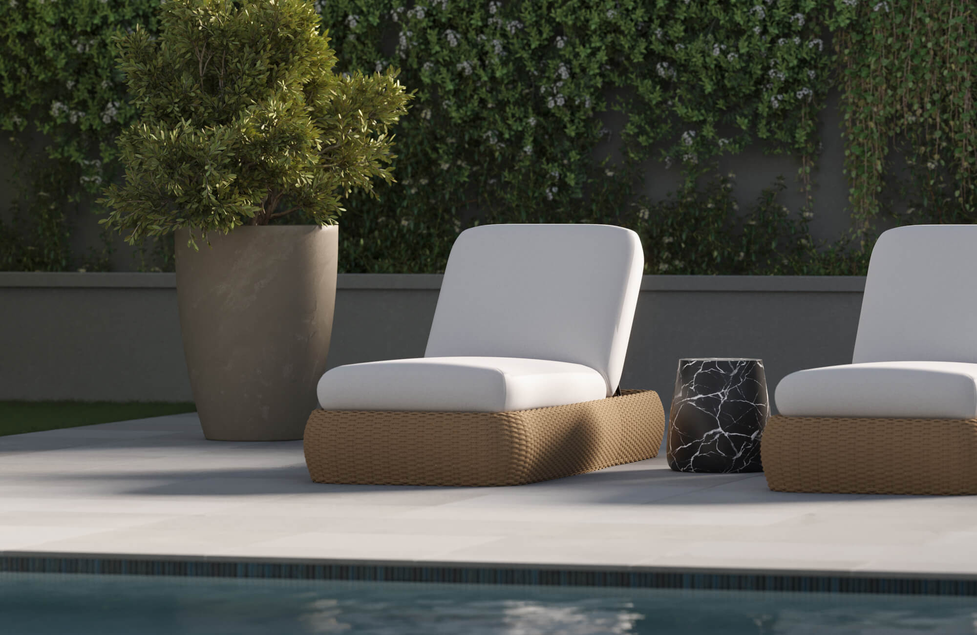 null Placed beside a pool, bright white cushions on warm brown woven chairs enhance comfort and contrast against the gray patio and green plants.