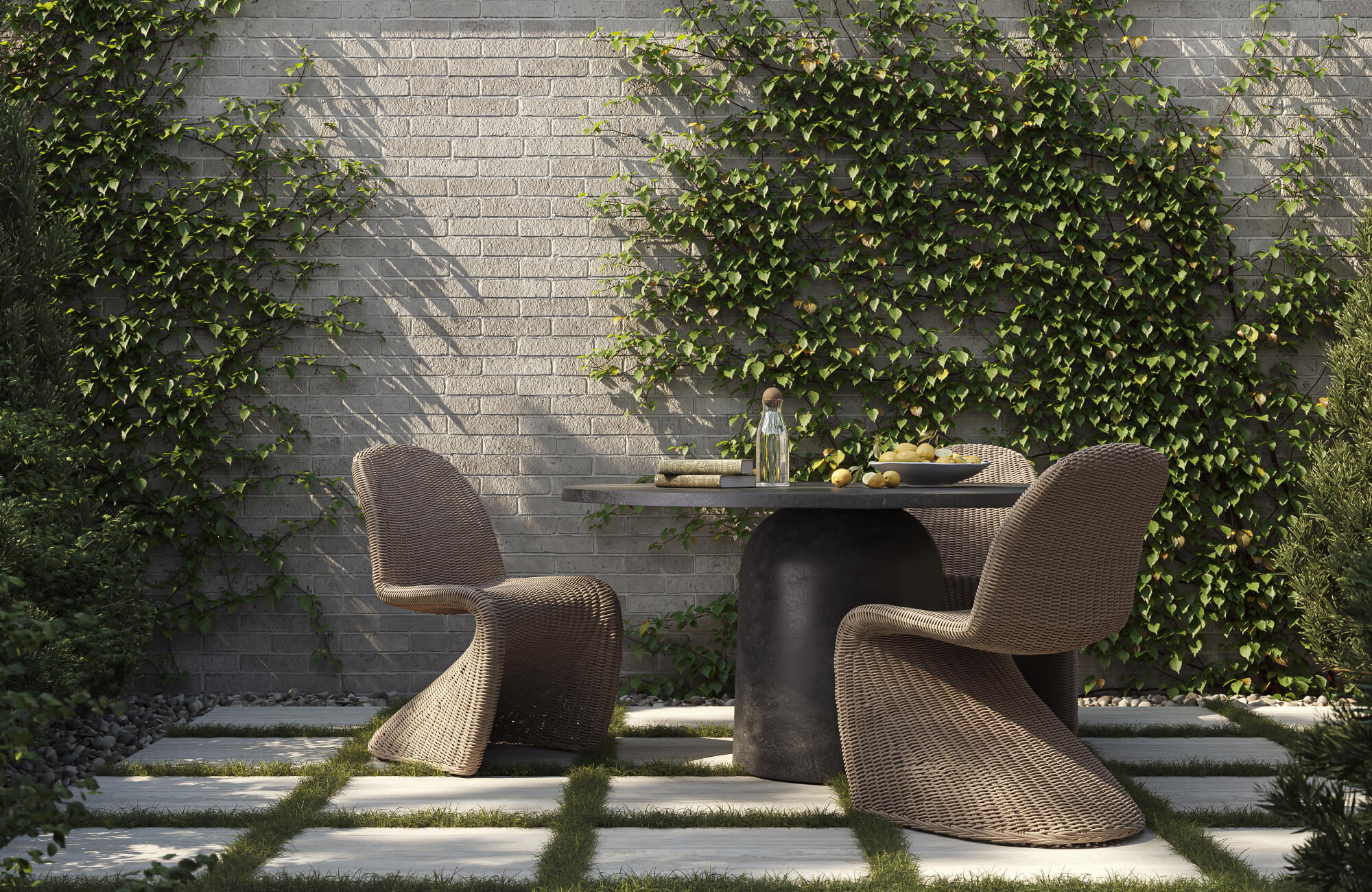 null In a garden patio, brown woven chairs sit around a dark gray table against a light gray brick wall with green vines, showing a setup without cushions.