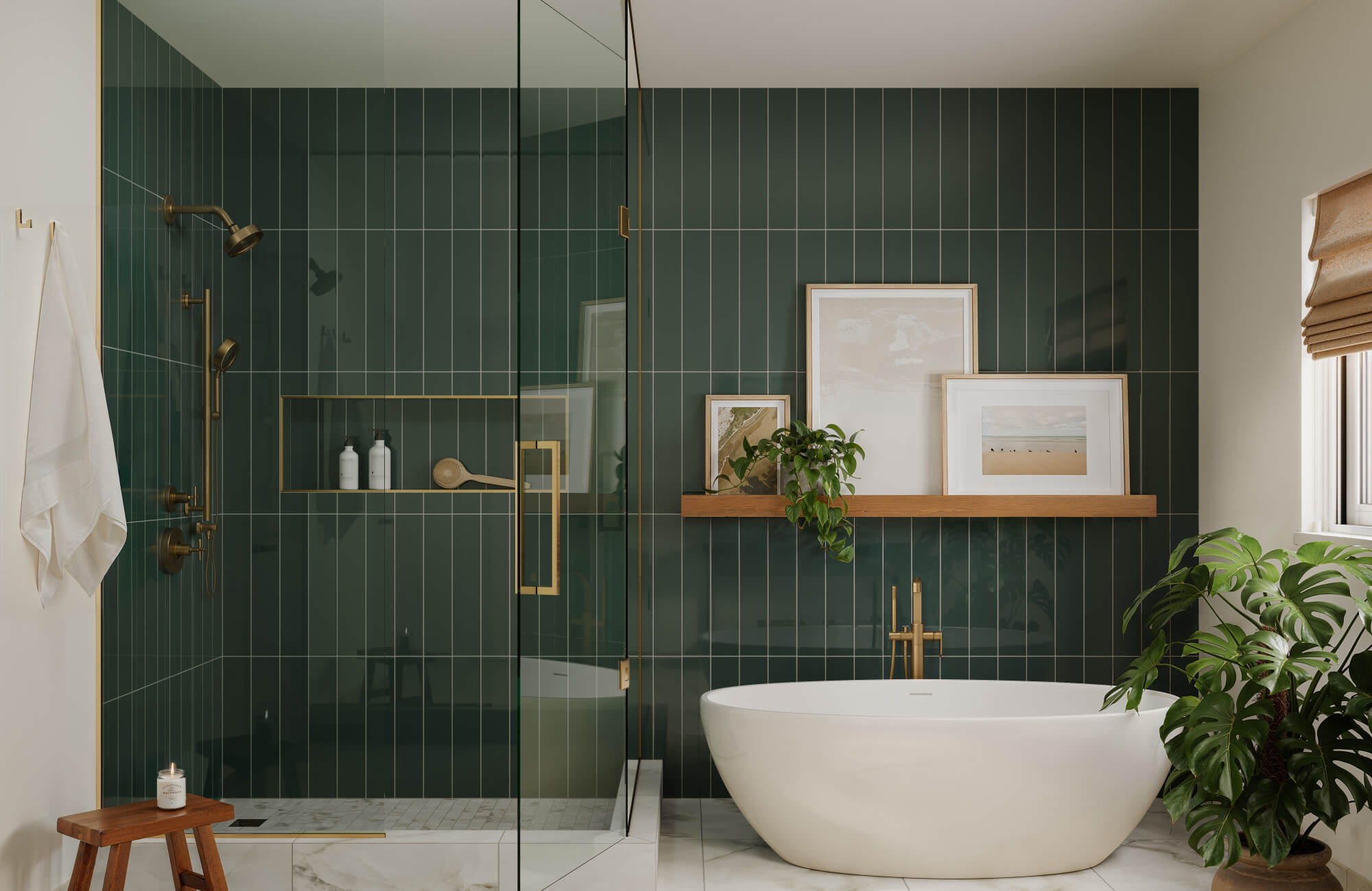 Modern bathroom with deep green tile walls brushed brass shower fittings, and a white soaking tub beneath a wooden ledge with minimalist decor.