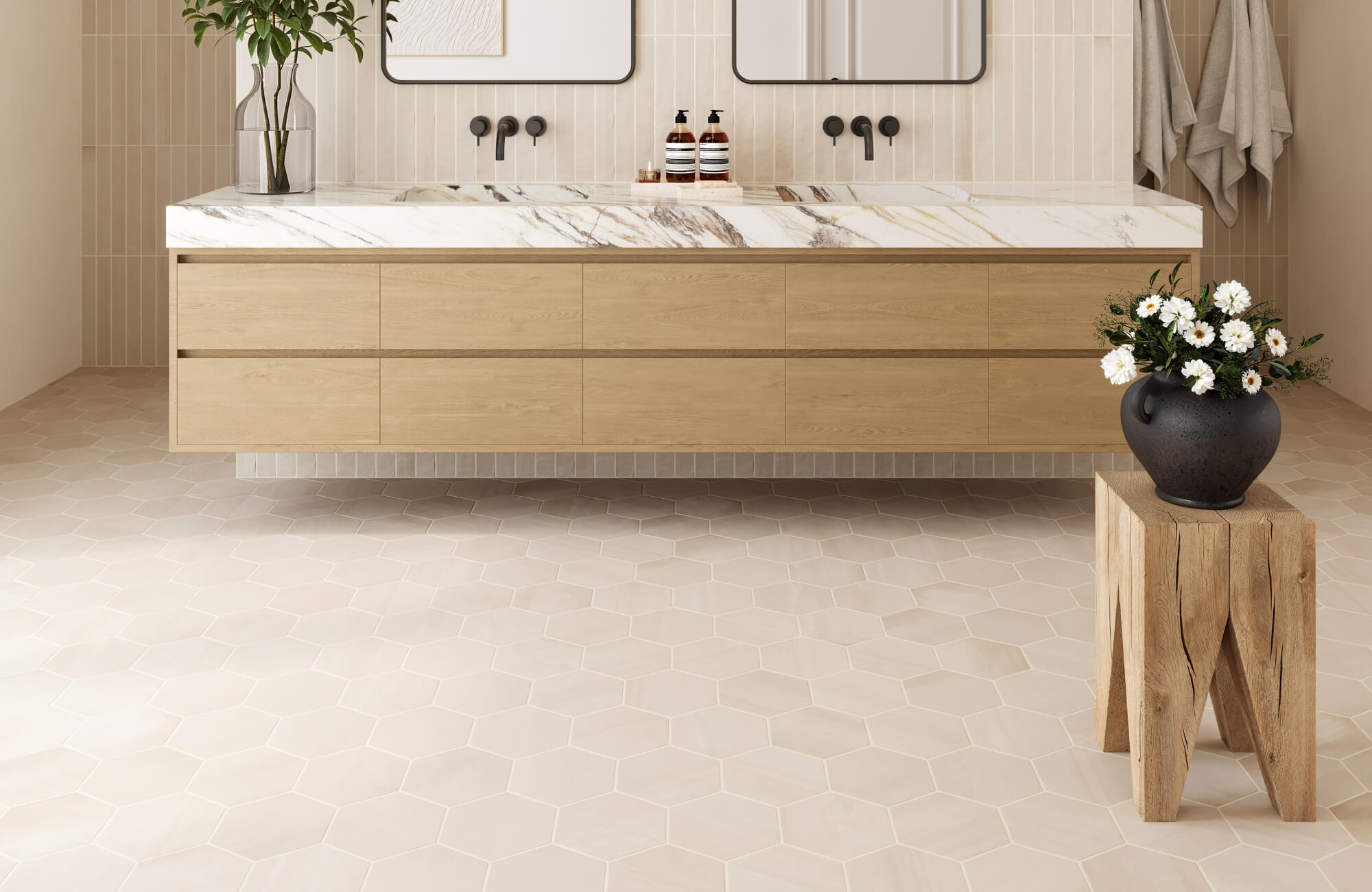 null Modern bathroom with floating wood vanity, marble countertop, and soft beige hexagon tile flooring for a sleek, airy feel.