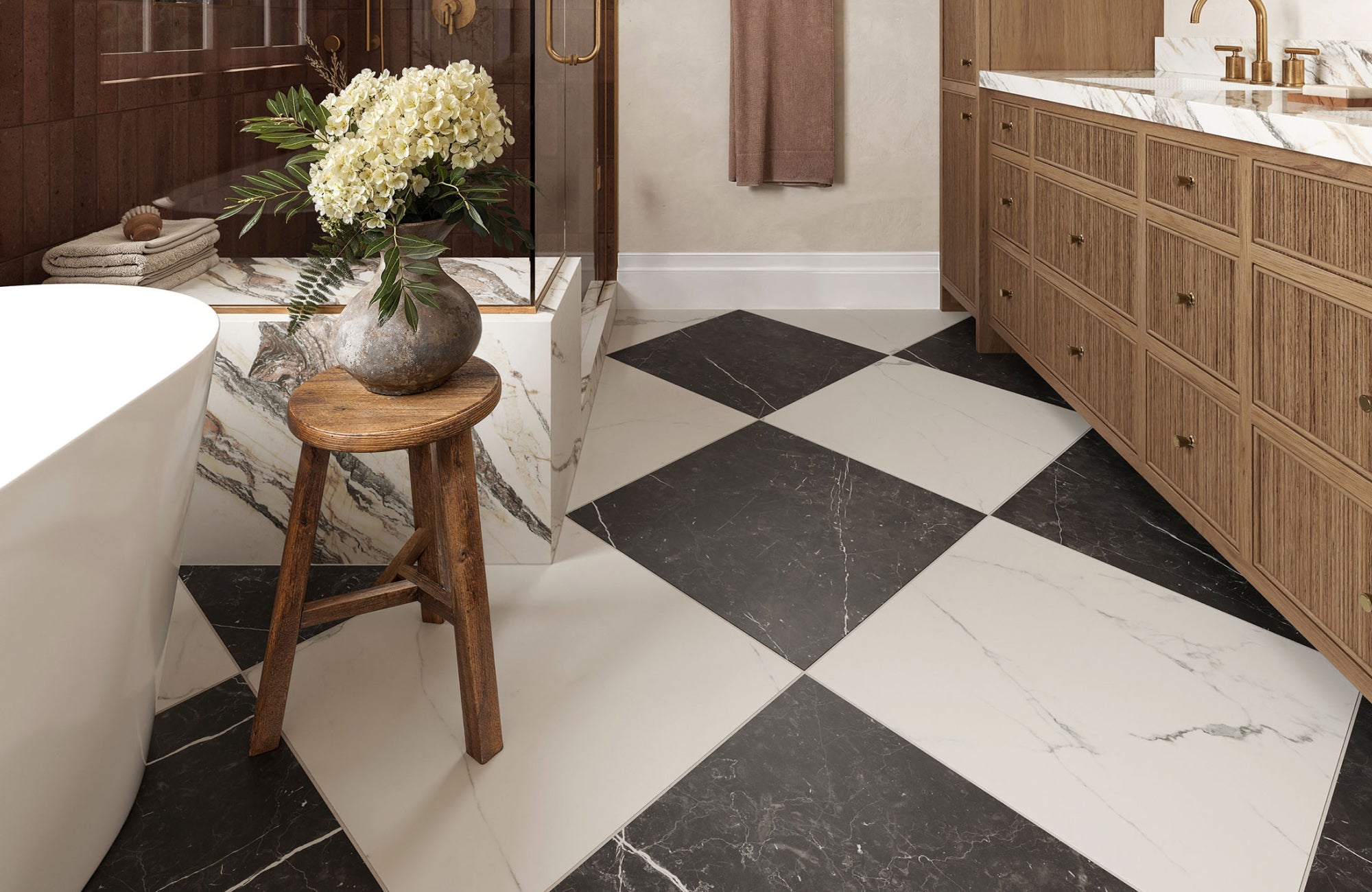 Checkerboard-style large-format tile flooring in a luxe bathroom, delivering bold contrast and visual impact.