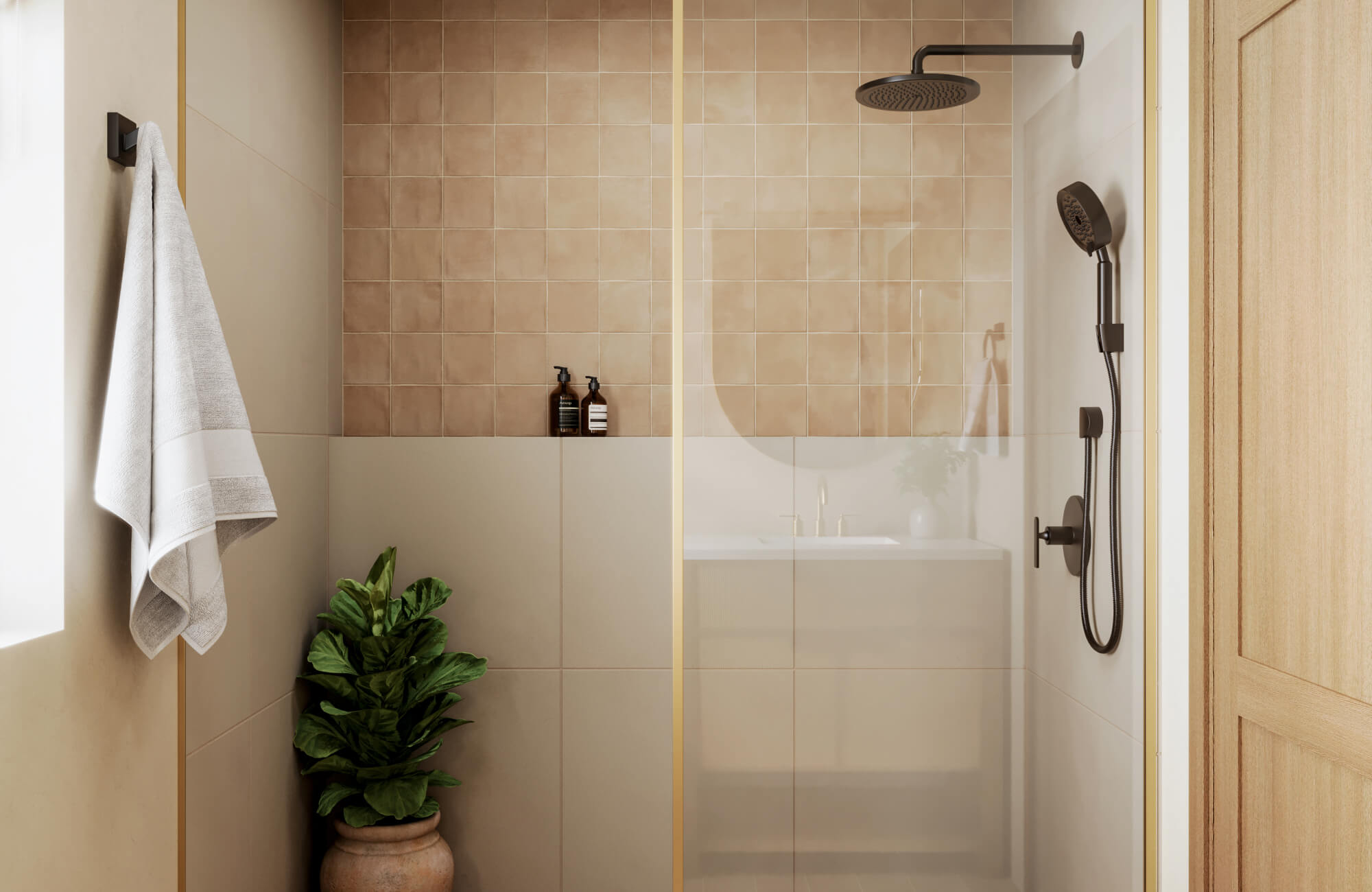 null Square terracotta-toned shower tiles create a warm focal wall, paired with matte fixtures and a neutral palette for a grounded, spa-like vibe.