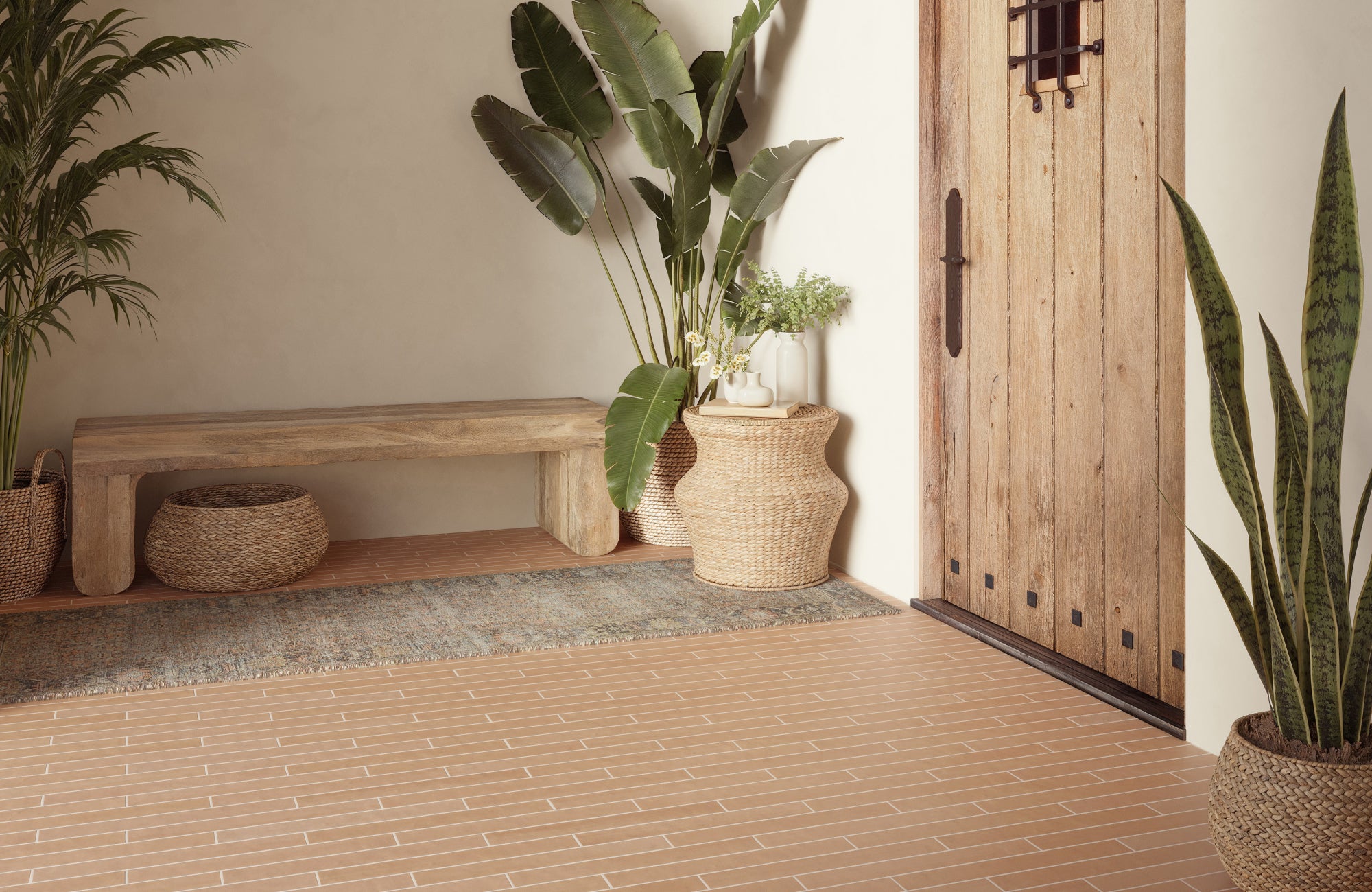 null Entryway with slim rectangular terracotta tiles in a linear pattern, styled with woven baskets and potted greenery.
