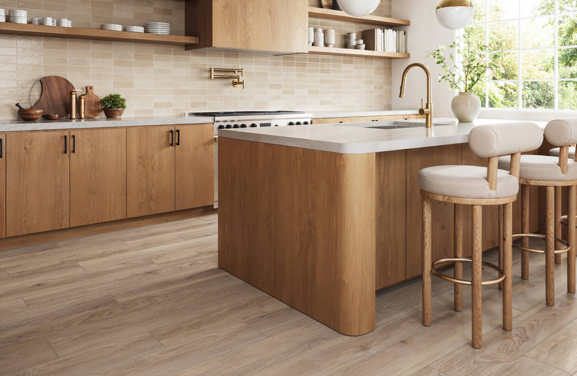A warm, modern kitchen featuring wood look tile flooring paired with oak cabinetry and beige subway tile backsplash for a cohesive design.