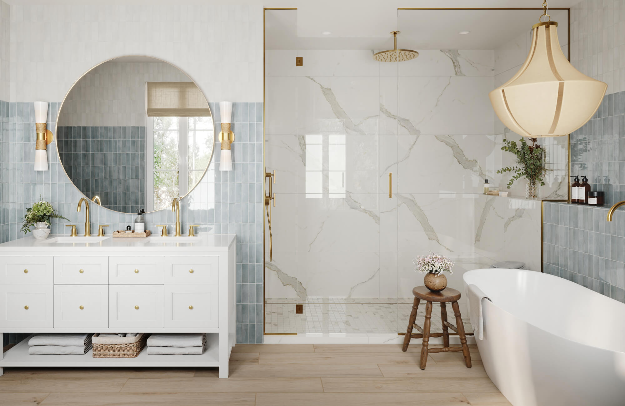 null Bright transitional bathroom featuring a large round mirror with brass accents, soft blue subway tile, marble shower walls, and warm gold fixtures that create a refined spa-like ambiance.