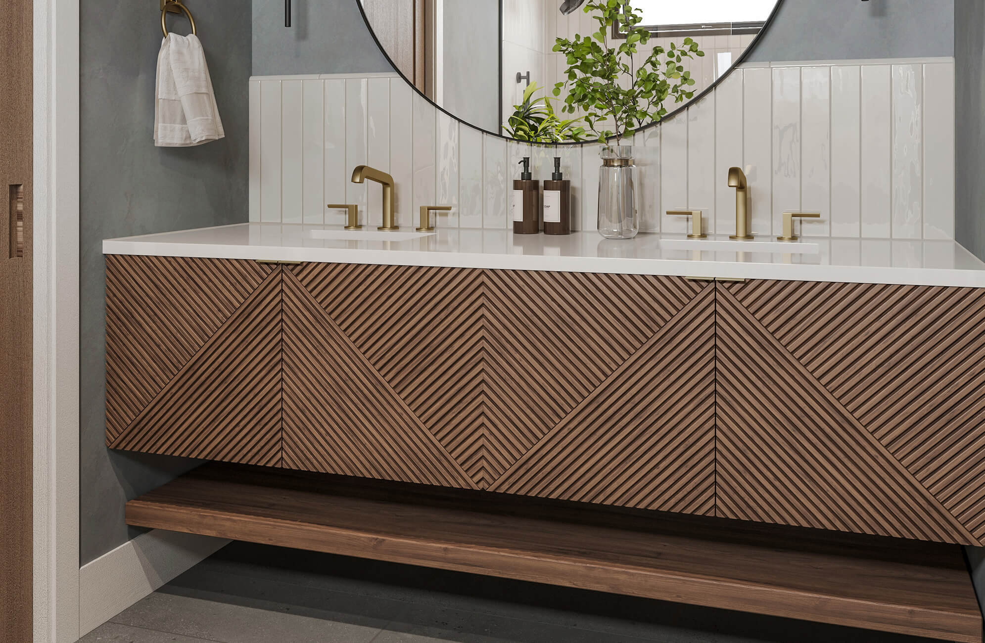 null Modern bathroom double vanity featuring a floating wood cabinet with geometric chevron detailing, white countertop, brushed gold fixtures, and a large round mirror that enhances the space’s contemporary elegance.
