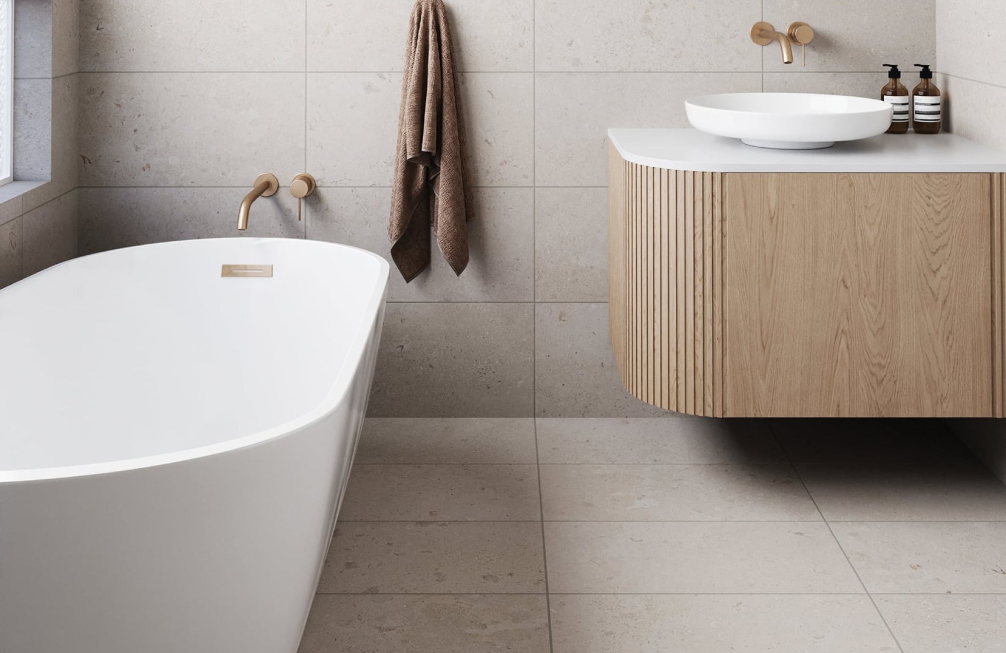 null Minimalist bathroom with large-format stone-look tiles on both floor and walls, offering a seamless, spa-like feel.