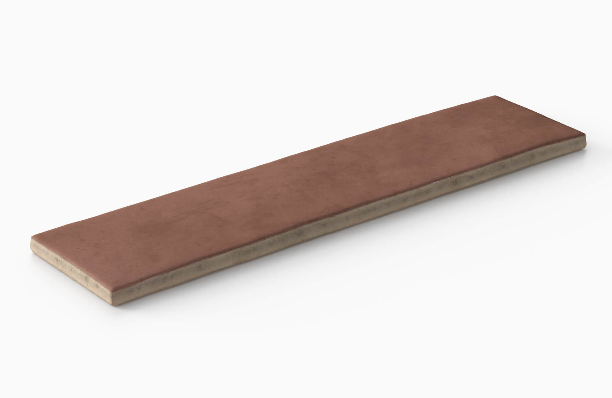 Rust-colored matte porcelain subway tile in a slim rectangular format with a smooth surface and slightly beveled edges, shown from an angled view on a neutral background.