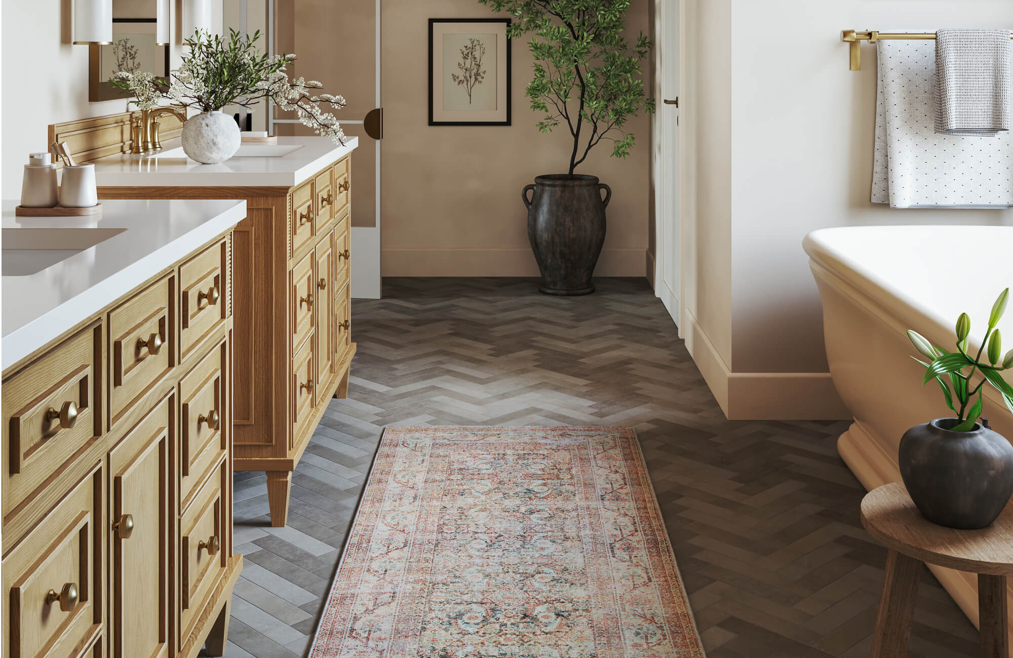 Elegant bathroom with wood vanities, a freestanding tub, and a dark herringbone subway tile floor accented by a vintage runner rug.