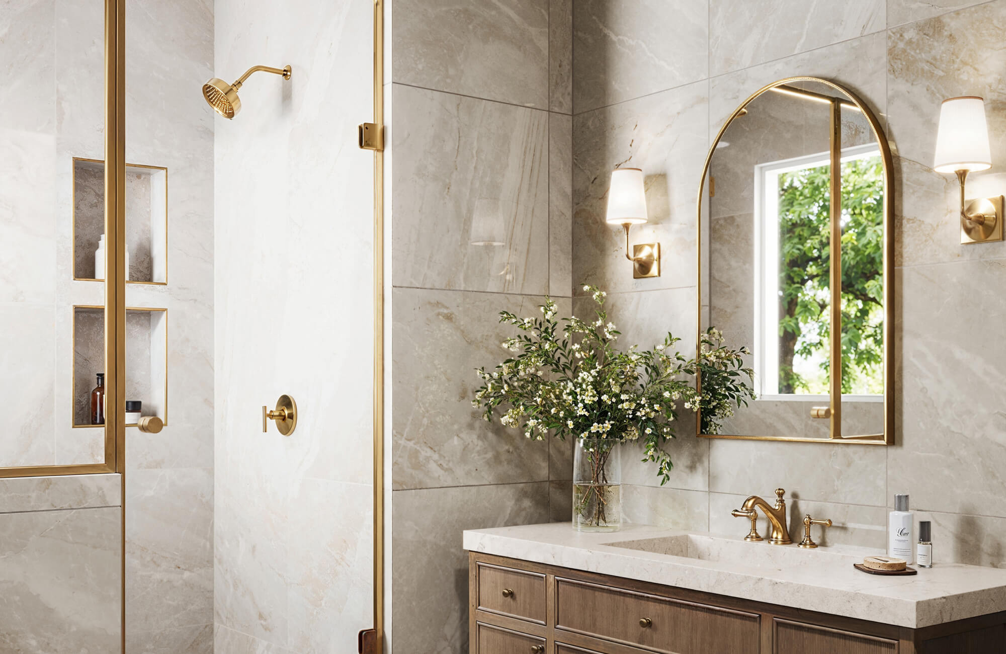 Elegant bathroom with beige large-format tiles on walls, gold fixtures, and built-in shower niches for a seamless, refined look.