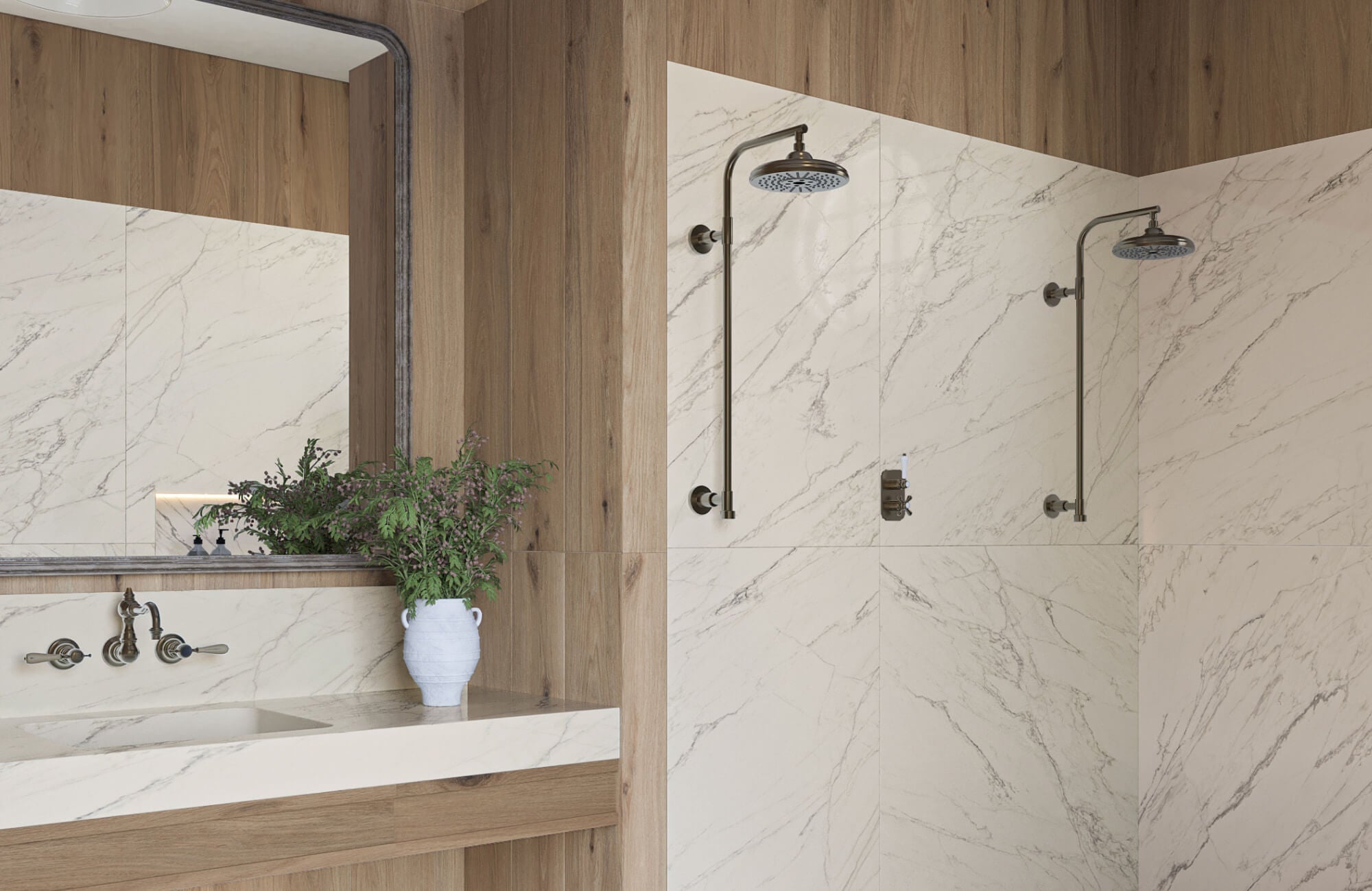 Dual shower space with matte marble-look large tiles and wood-look tile walls around a floating sink.