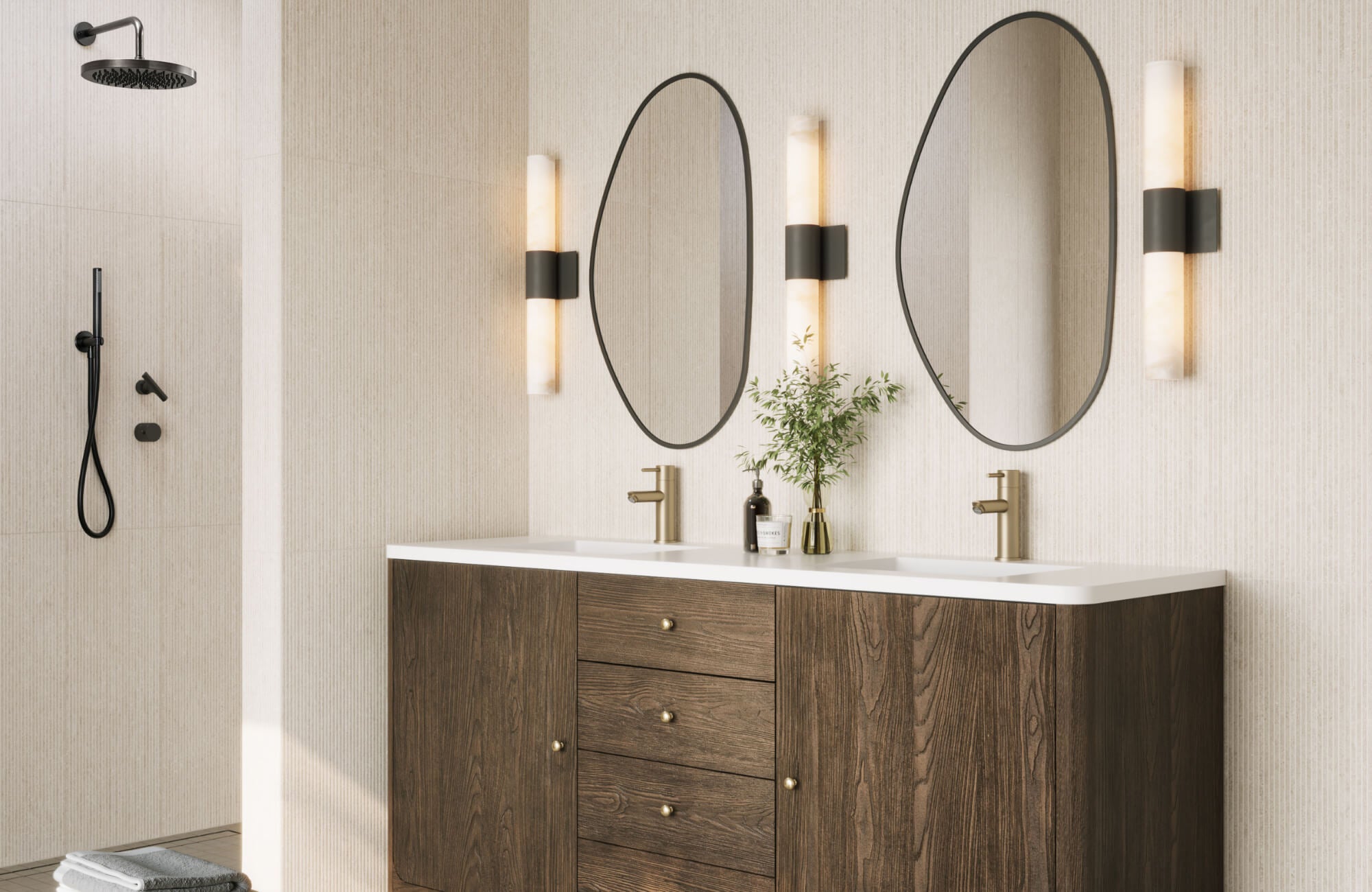 Contemporary bathroom with dual oval mirrors, dark wood vanity, wall sconces, and minimalist shower in a clean, neutral-tone design.