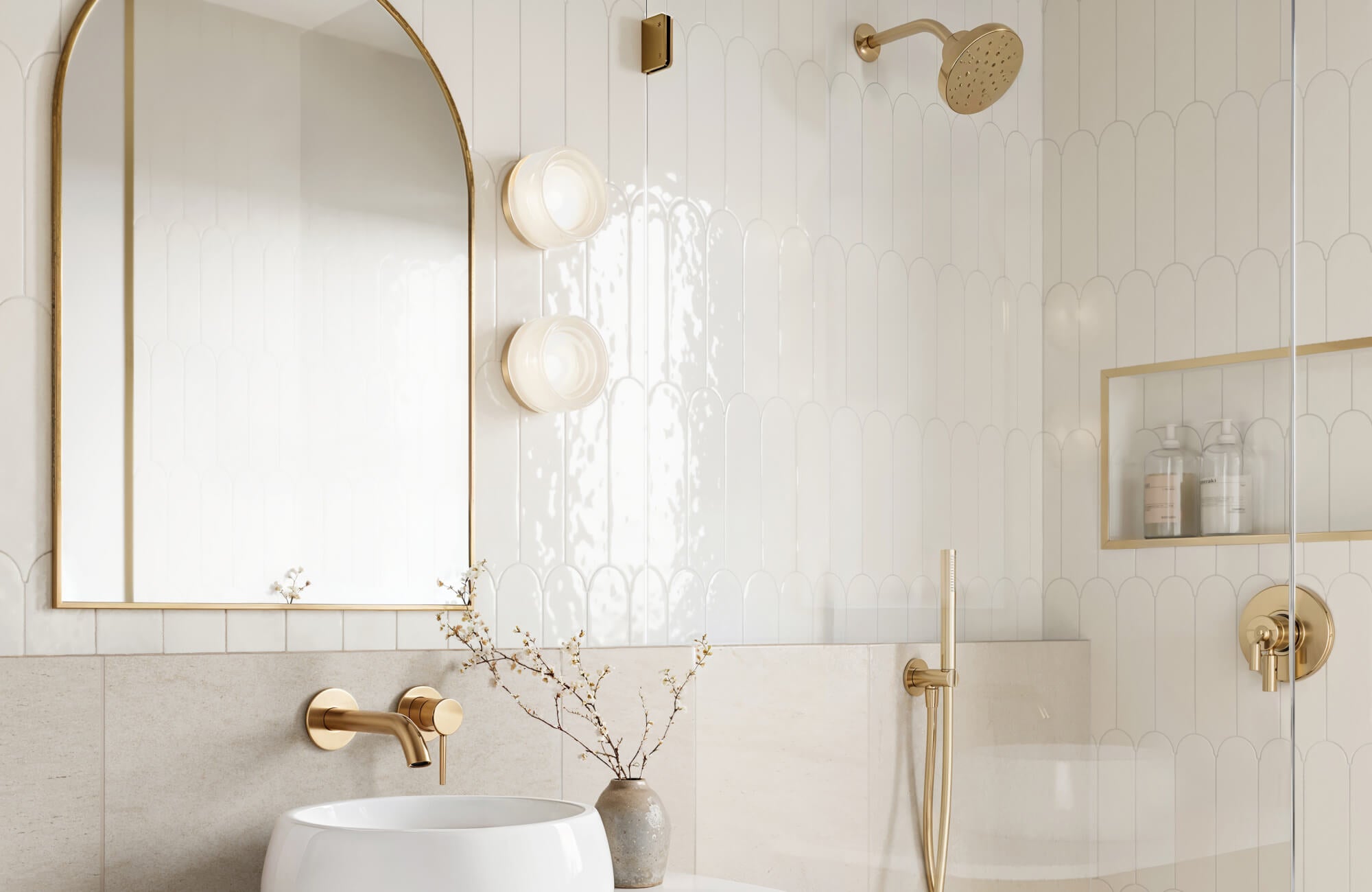 null Elegant bathroom with glossy scalloped white tiles, a gold-framed arched mirror, and matching gold fixtures, creating a refined and luxurious aesthetic.