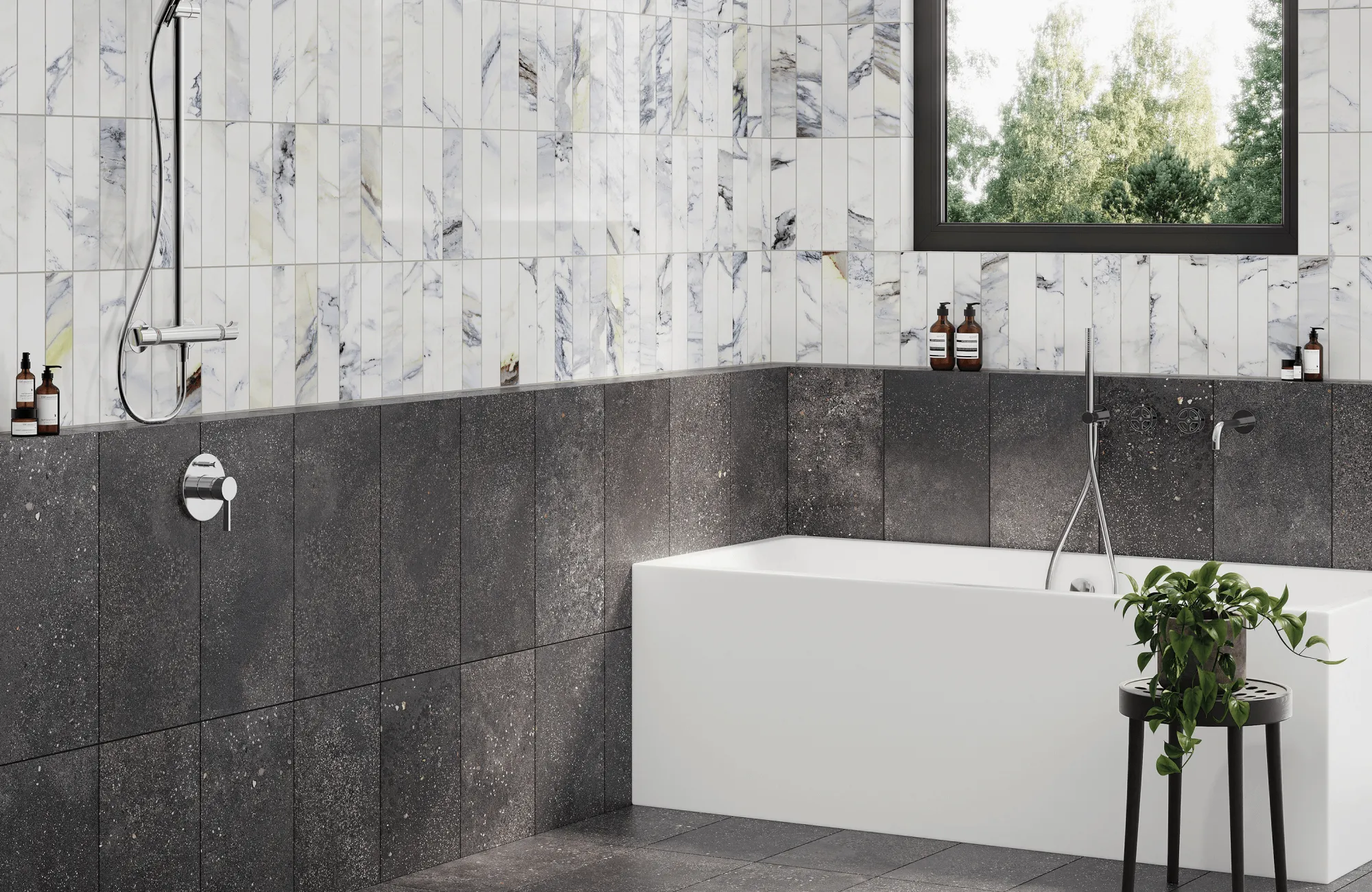 Modern bathroom with polished white marble-look vertical tiles, dark charcoal stone-look wall and floor tiles, a rectangular white tub, chrome shower fixtures, and a black-framed window overlooking greenery.