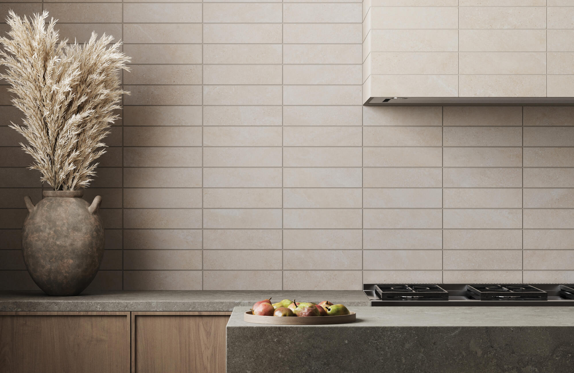 Modern minimalist kitchen with long beige subway tile backsplash in a stacked horizontal layout, featuring a matte stone-look finish, warm wood cabinetry, and concrete countertops.