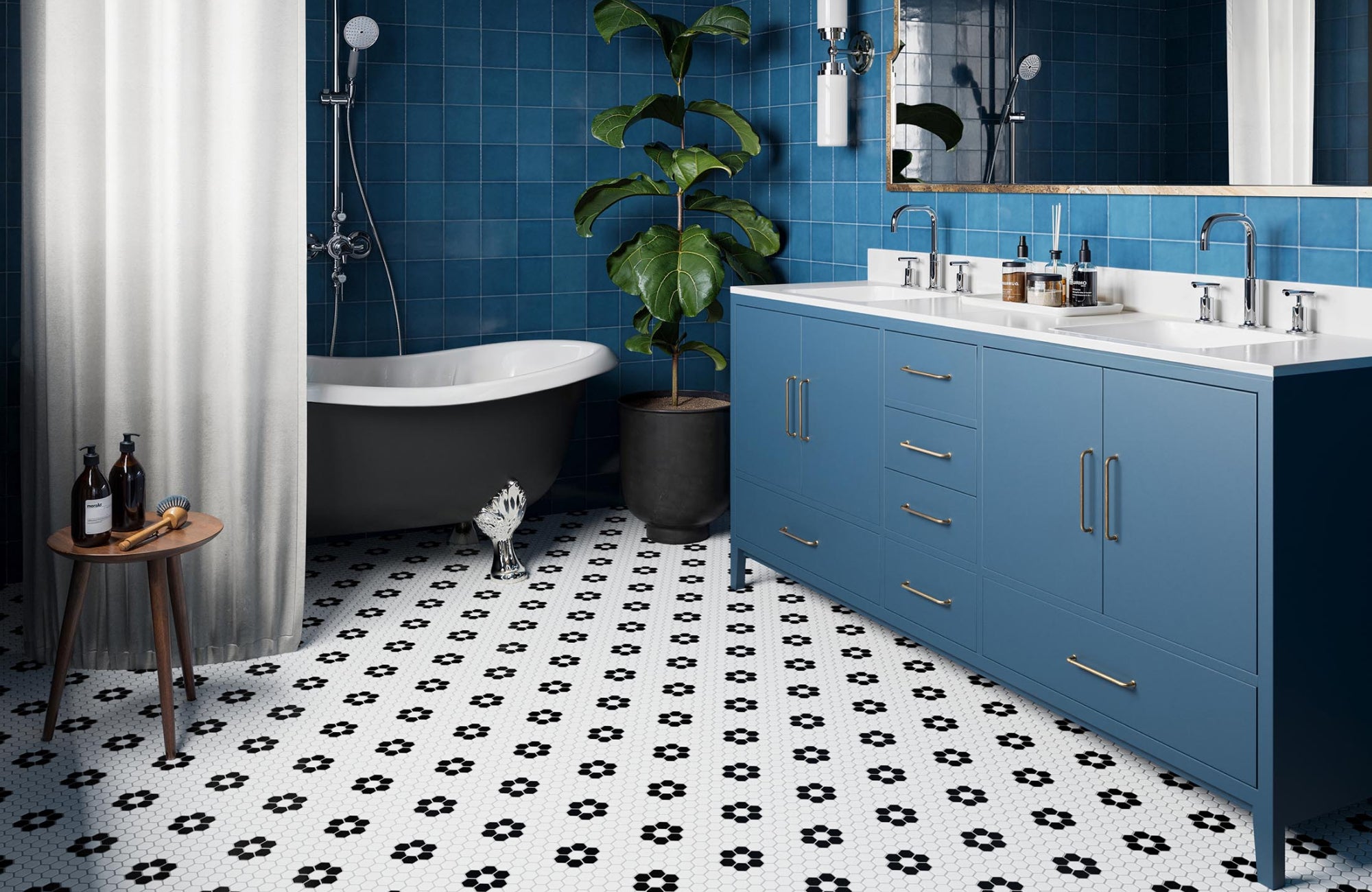 null White and black small hex tile mosaic floor forming a floral pattern, adding charm to a blue vanity bathroom.