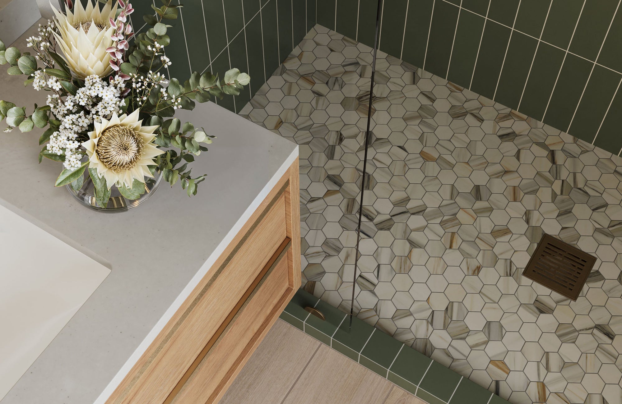 null Mixed white and gray hex tile shower floor with a geometric layout, accented by a green wall and natural wood vanity.