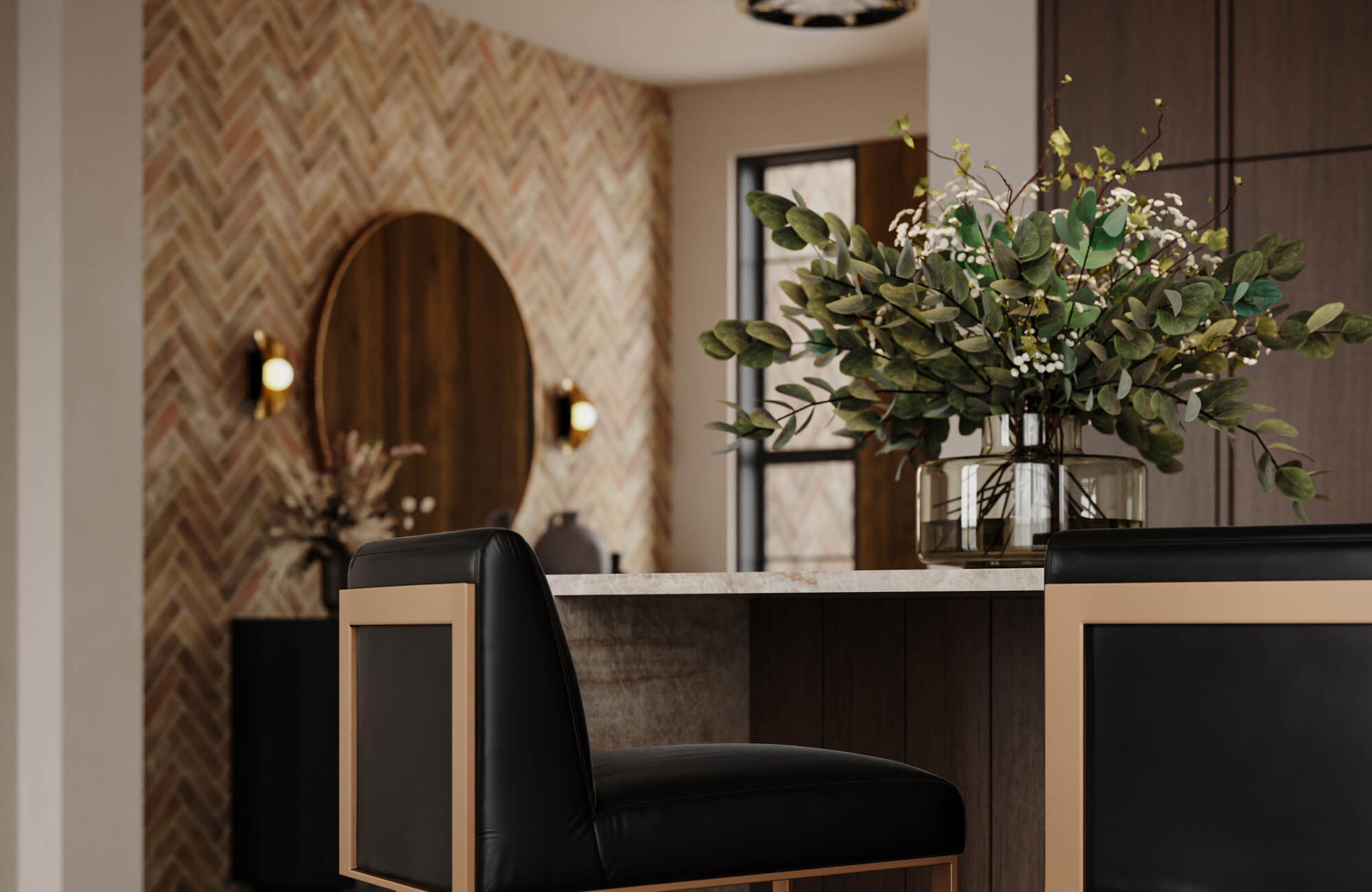 null A smoked glass vessel overflowing with eucalyptus stems and delicate branches creates an organic focal point atop a kitchen island.