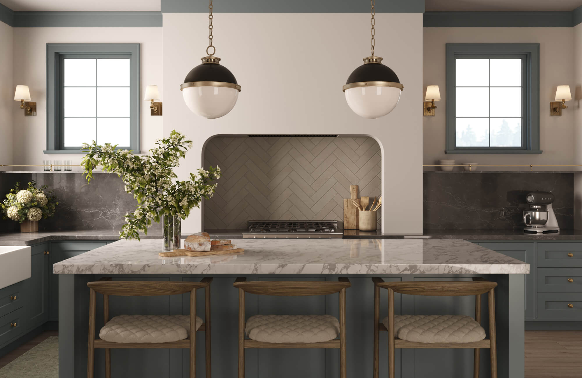 Transitional dining room lighting is highlighted by a pair of classic globe pendant lights with black metal caps and brass accents suspended above the island.
