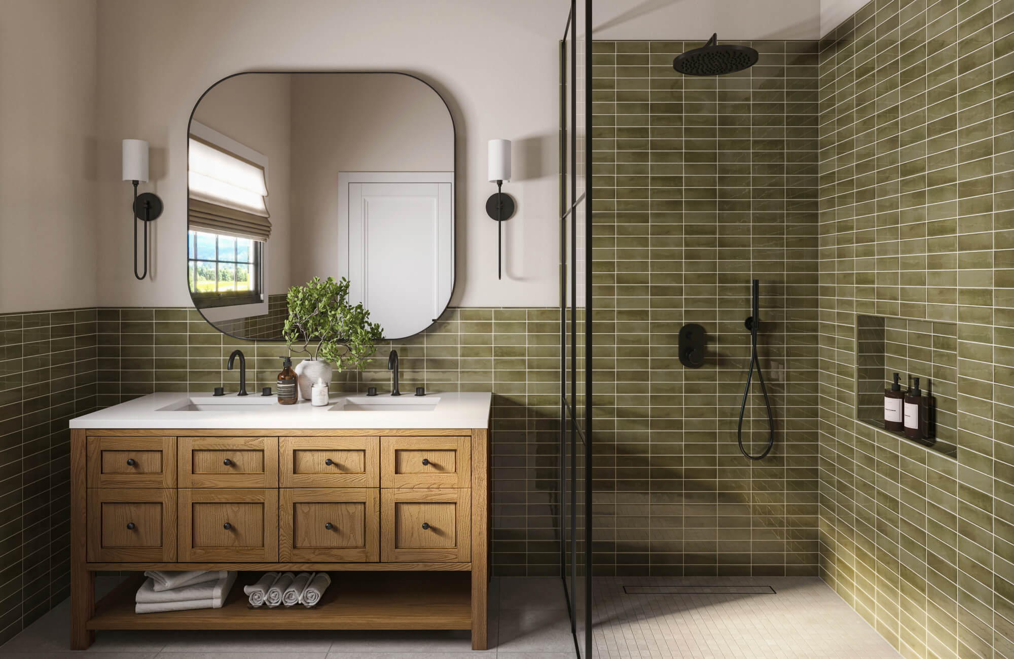 null Black-framed mirror above a wood vanity in a modern bathroom with green subway tile walls and matte black fixtures.
