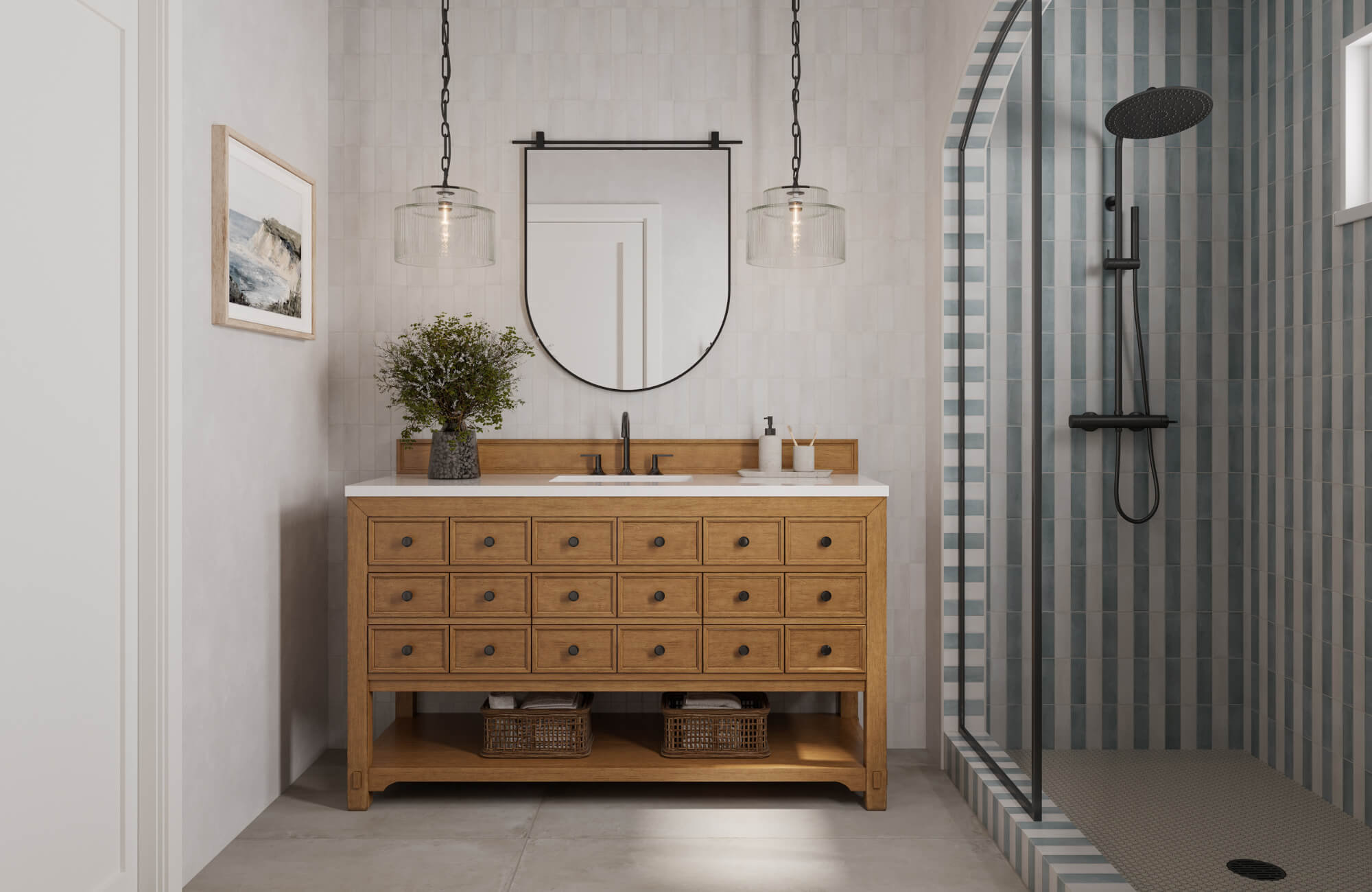 Contemporary bathroom with wood vanity, round mirror, pendant lights, and glass shower featuring striped blue and gray wall tiles.