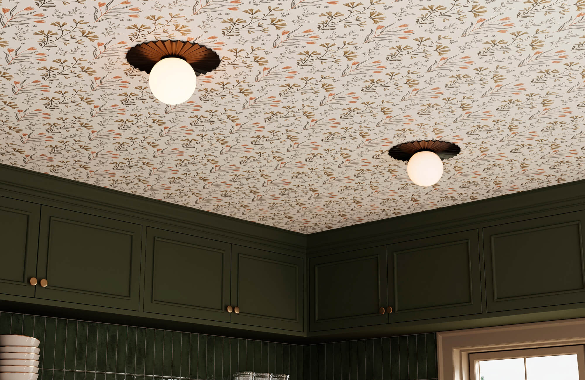 Classic kitchen with dark green cabinetry, vertical subway tile wall, and floral patterned ceiling wallpaper with modern globe lights.