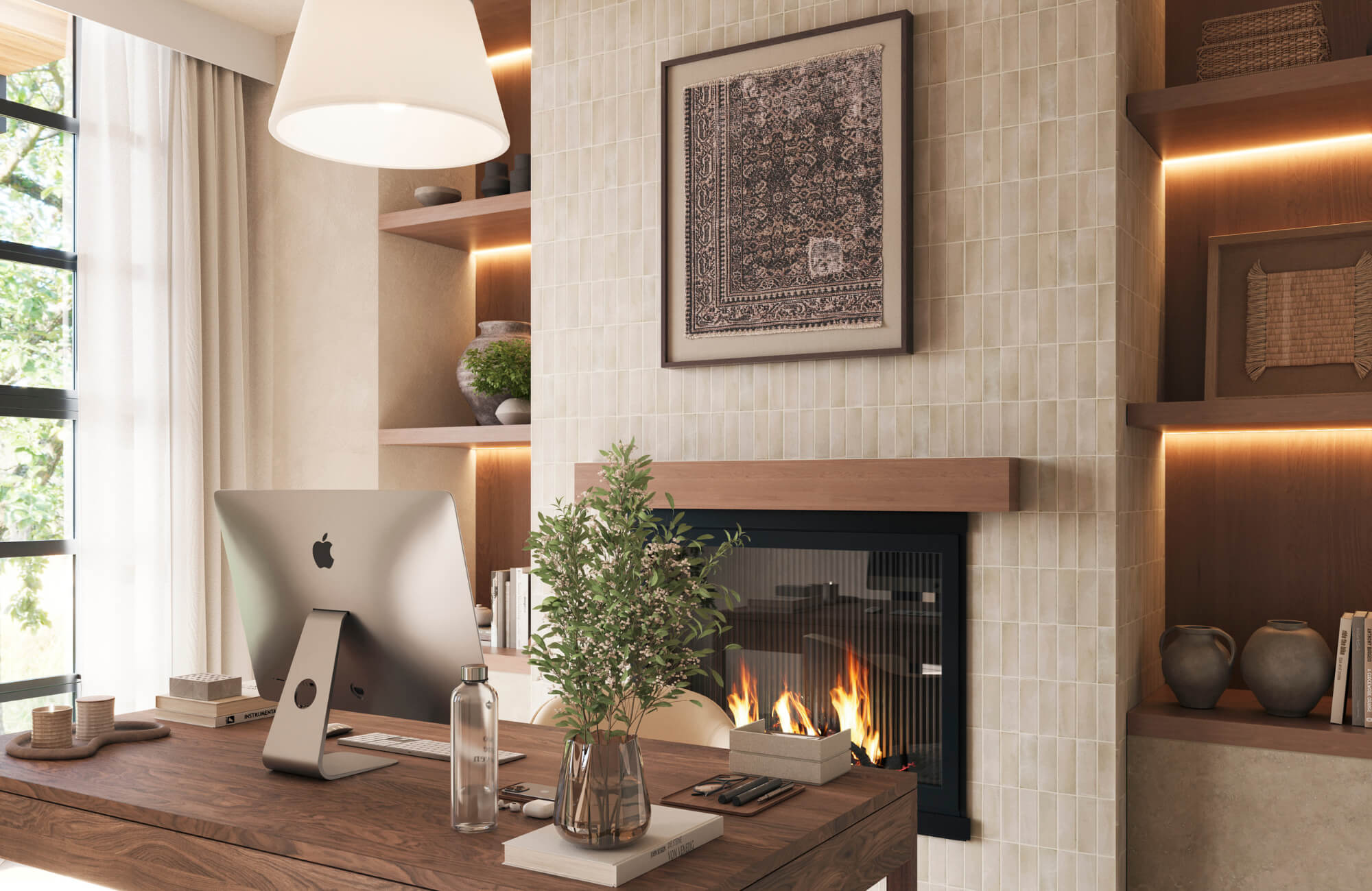 Modern home office with wood desk, tiled fireplace wall, framed textile art, warm shelving lighting, and large pendant lamp.