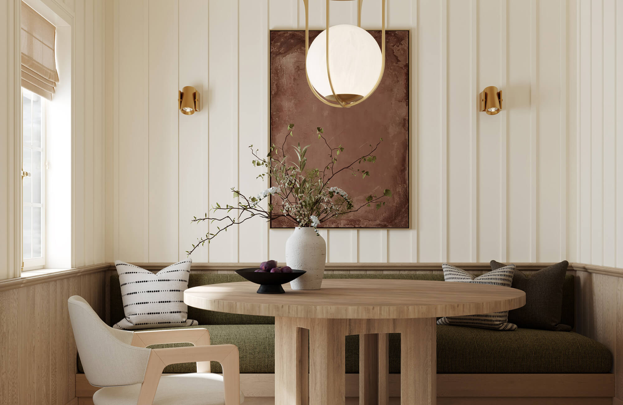 Vertical wall art in a compact dining corner draws the eye upward, subtly enhancing the sense of height and making the ceiling feel higher