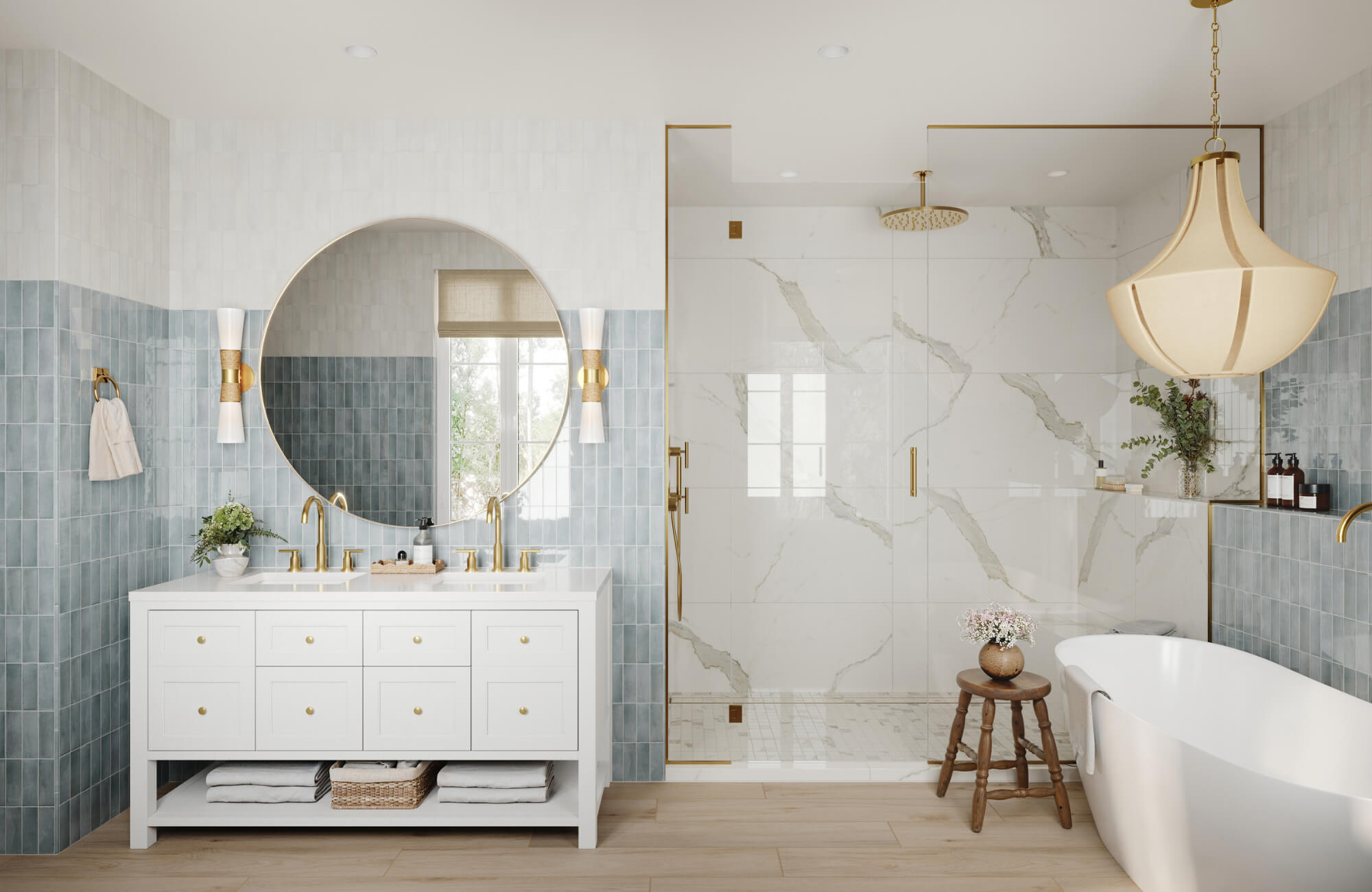 null Elegant bathroom featuring Calacatta marble tile shower walls, brass fixtures, blue-gray tile accents, and a freestanding tub.