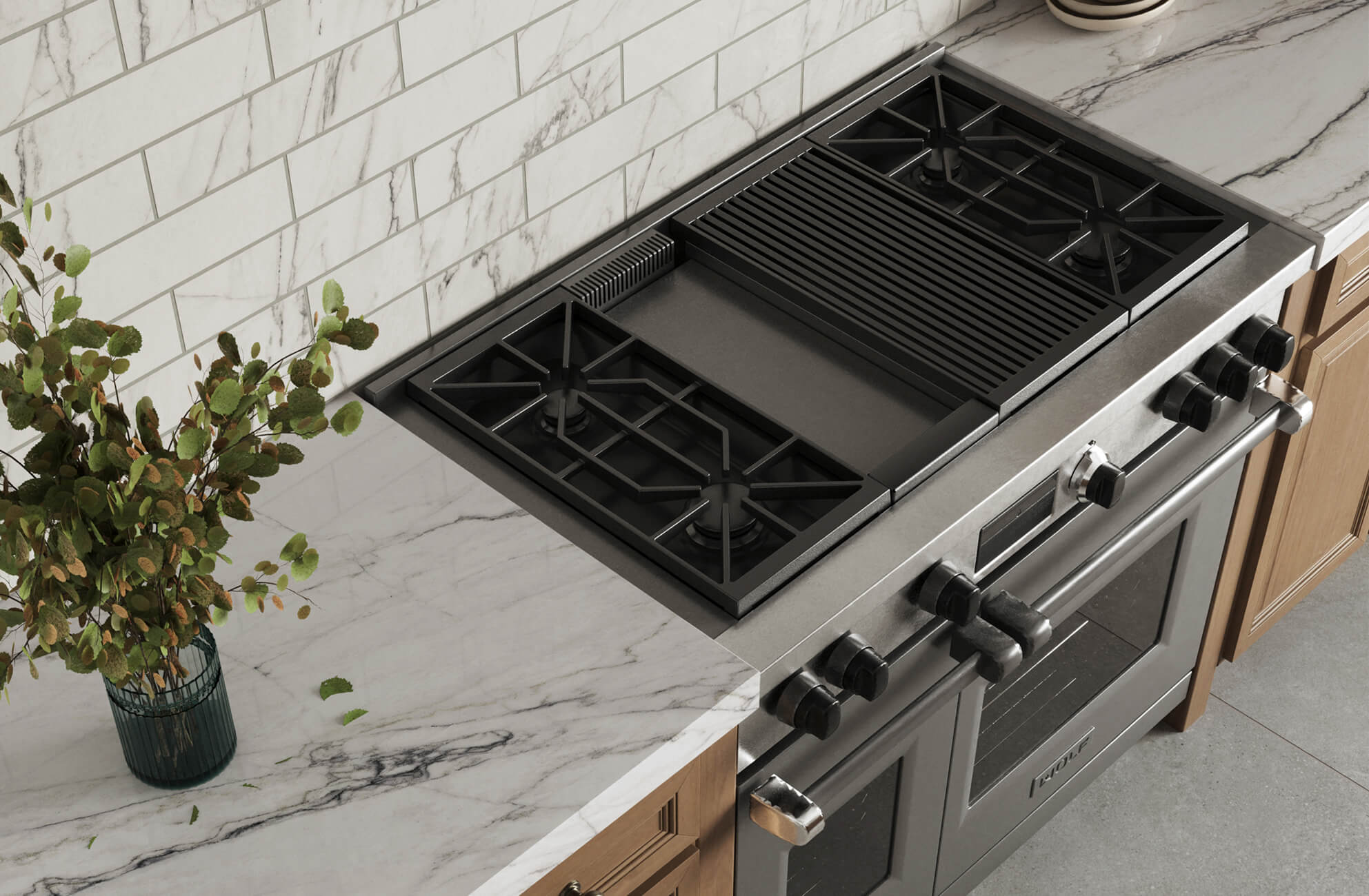 null Sleek kitchen with marble countertops and marble look subway tile backsplash, featuring a stainless steel stove with black grates and knobs.