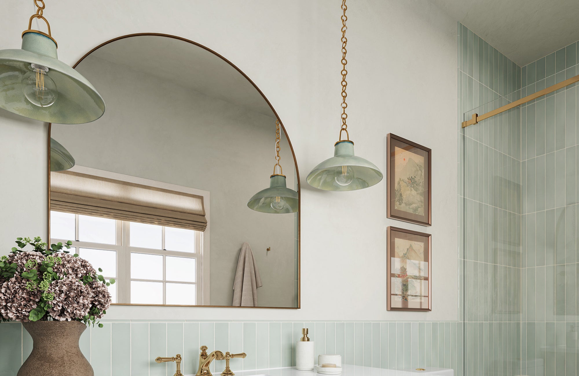 Tall arched mirror over a 60-inch vanity with pendant lighting, reflecting soft green tones from the bathroom tile.