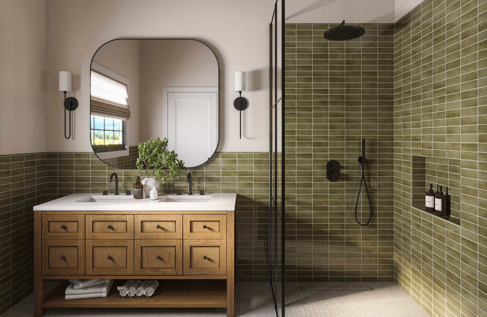Square, rounded-edge mirror above a 60-inch vanity with wall sconces, complementing green wall tile and black fixtures.