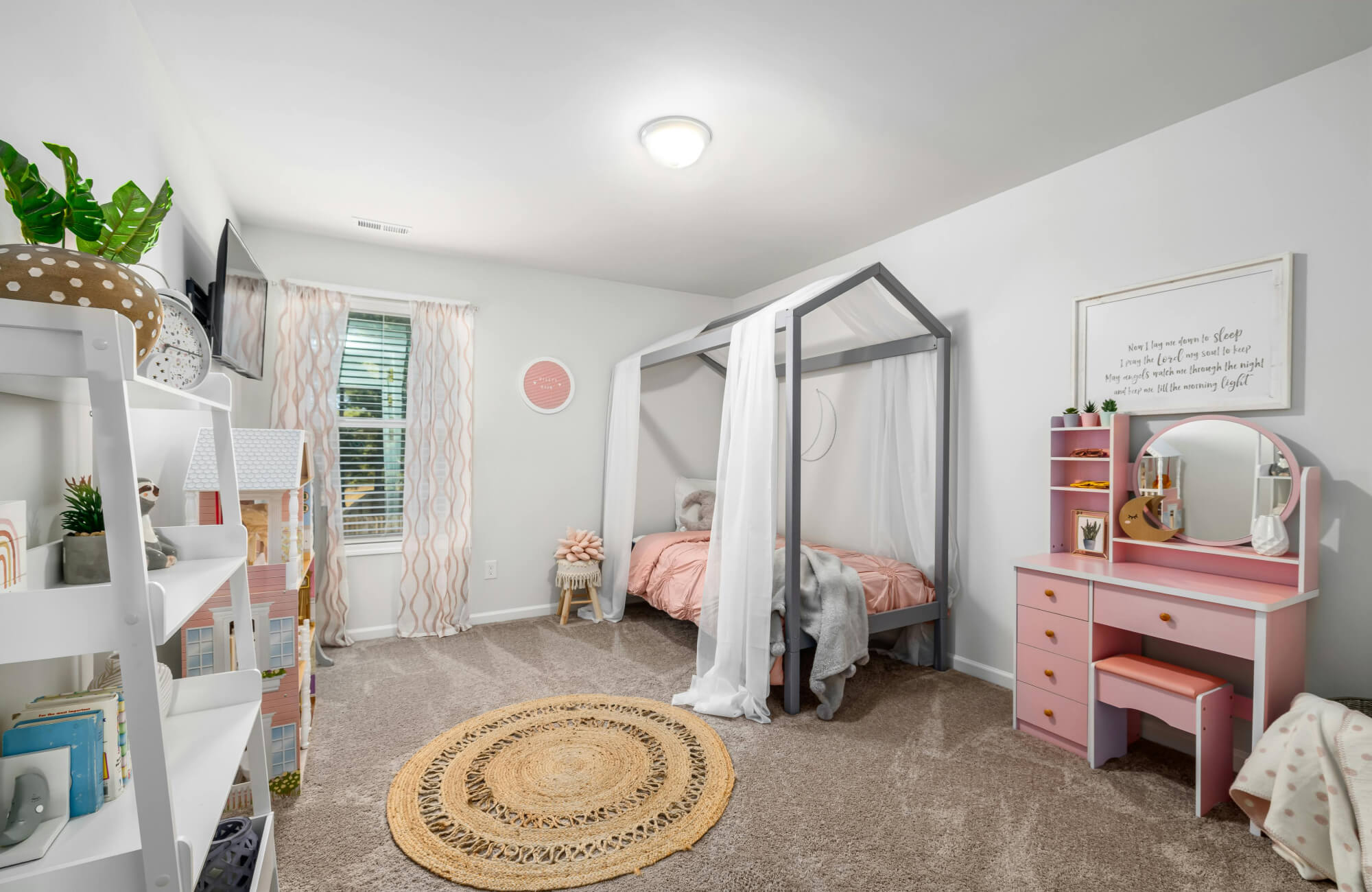 Round woven rug centered in a growing child’s room, sized to allow play while accommodating evolving furniture layouts.