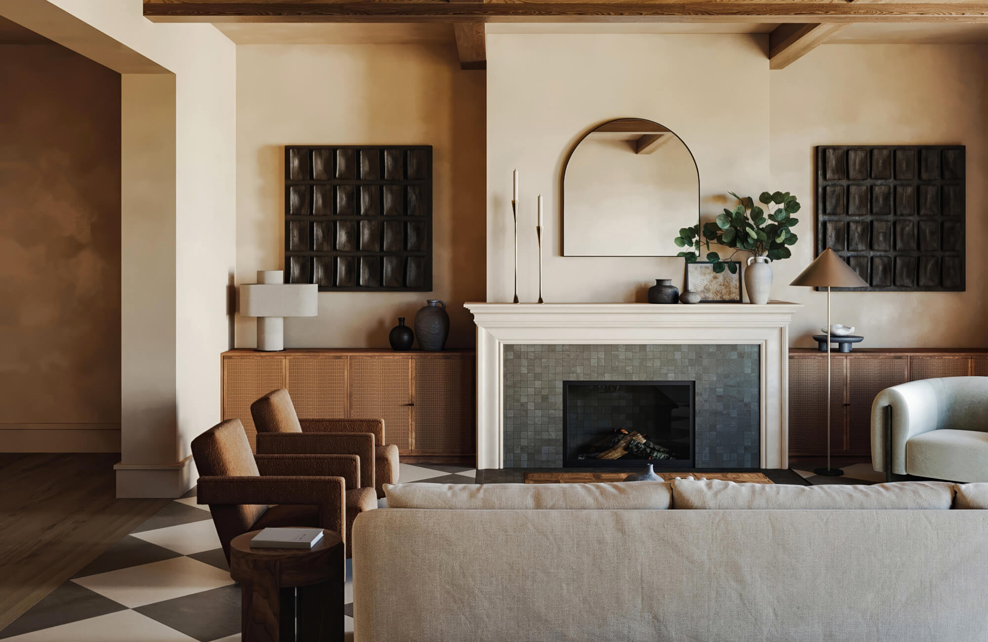Sophisticated living room with a tiled fireplace, an arched mirror above the mantel, and warm neutral tones throughout.