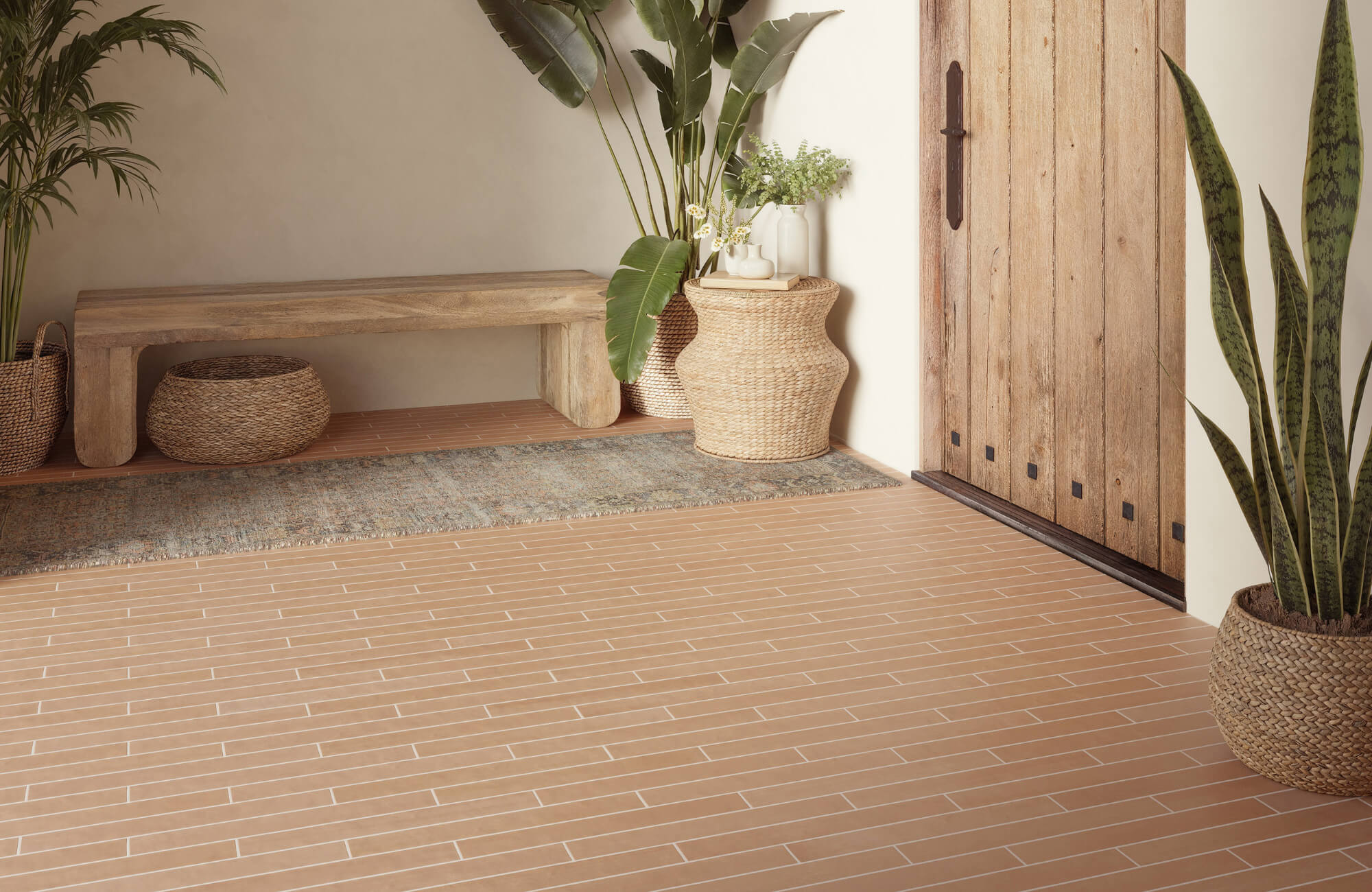 null Entryway with terracotta brick-style tile flooring, wooden bench, woven baskets, plants, and rustic wooden door for a natural look.