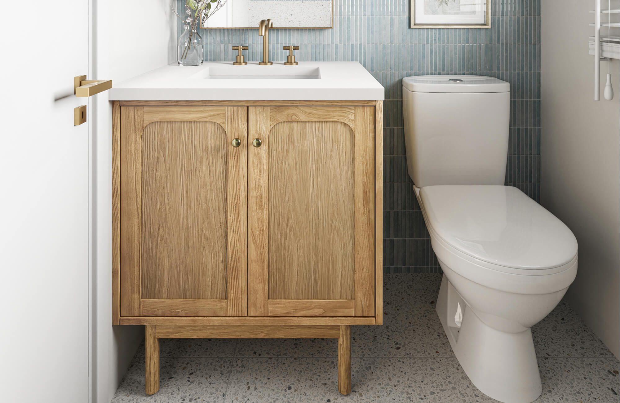 null Compact bathroom with light oak vanity, white countertop, brass fixtures, and vertical sage green wall tiles.