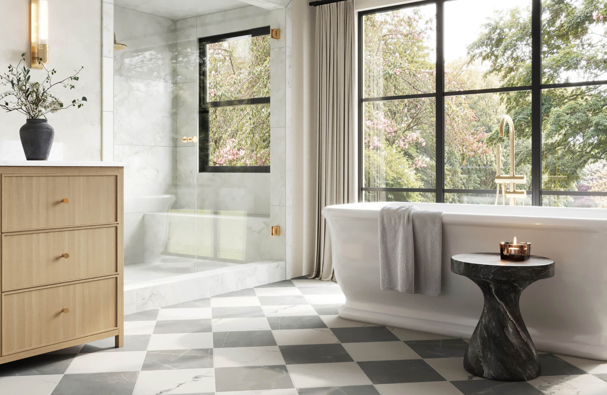 null Bright bathroom featuring gray and white checkerboard tile flooring, a freestanding tub, wood vanity, and large windows with garden views.