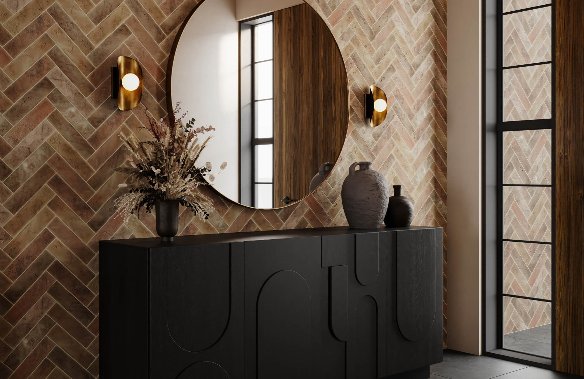 Stylish bathroom with a round mirror and brass sconces, highlighting how textured walls help diffuse reflected sunlight.